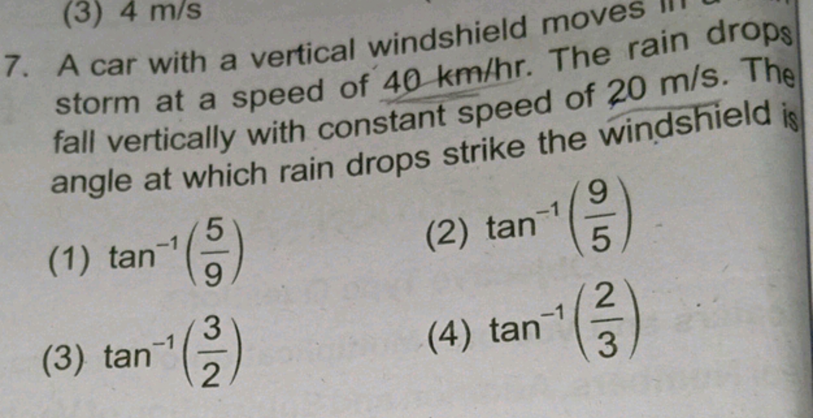 7. A car with a vertical windshield moves m storm at a speed of 40 km/