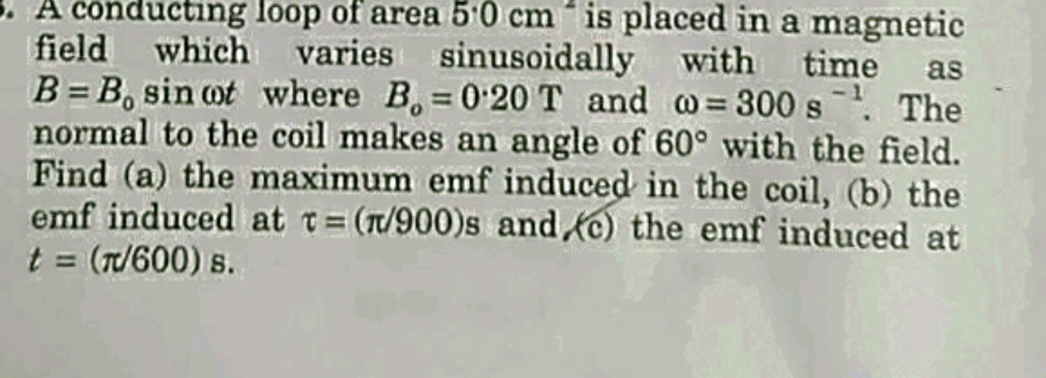 A conducting loop of area 5.0 cm is placed in a magnetic field which v