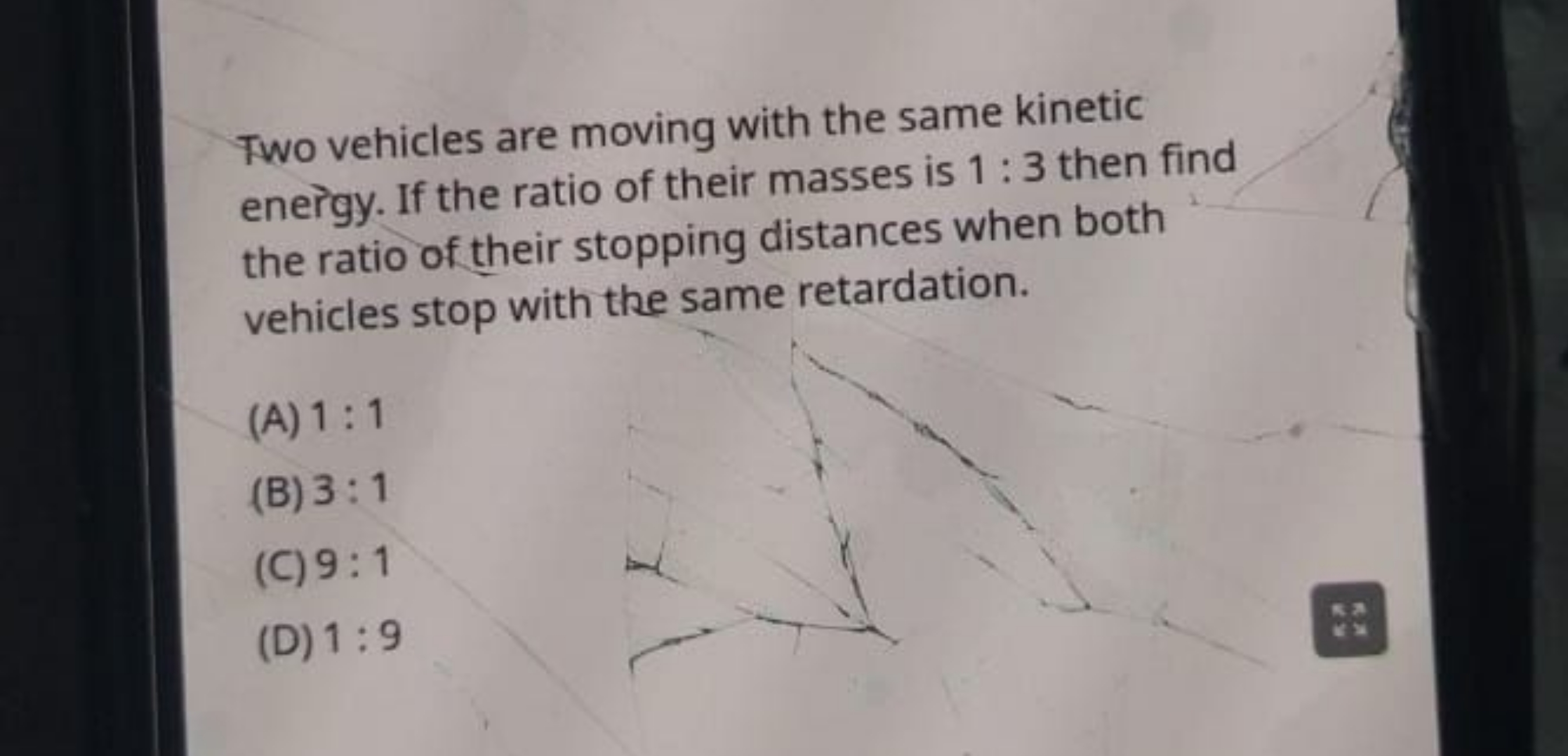 Two vehicles are moving with the same kinetic energy. If the ratio of 