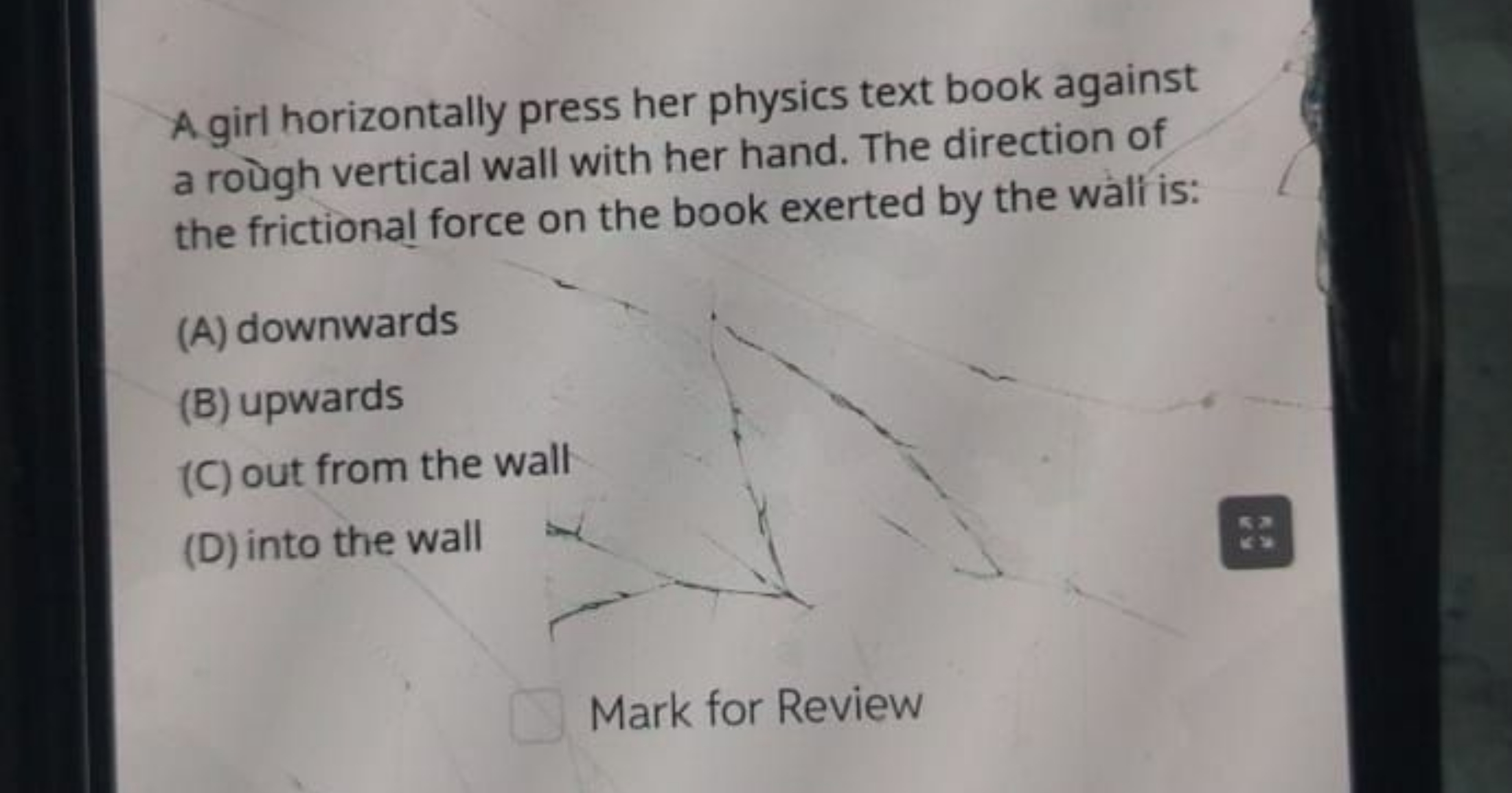 A girl horizontally press her physics text book against a roùgh vertic