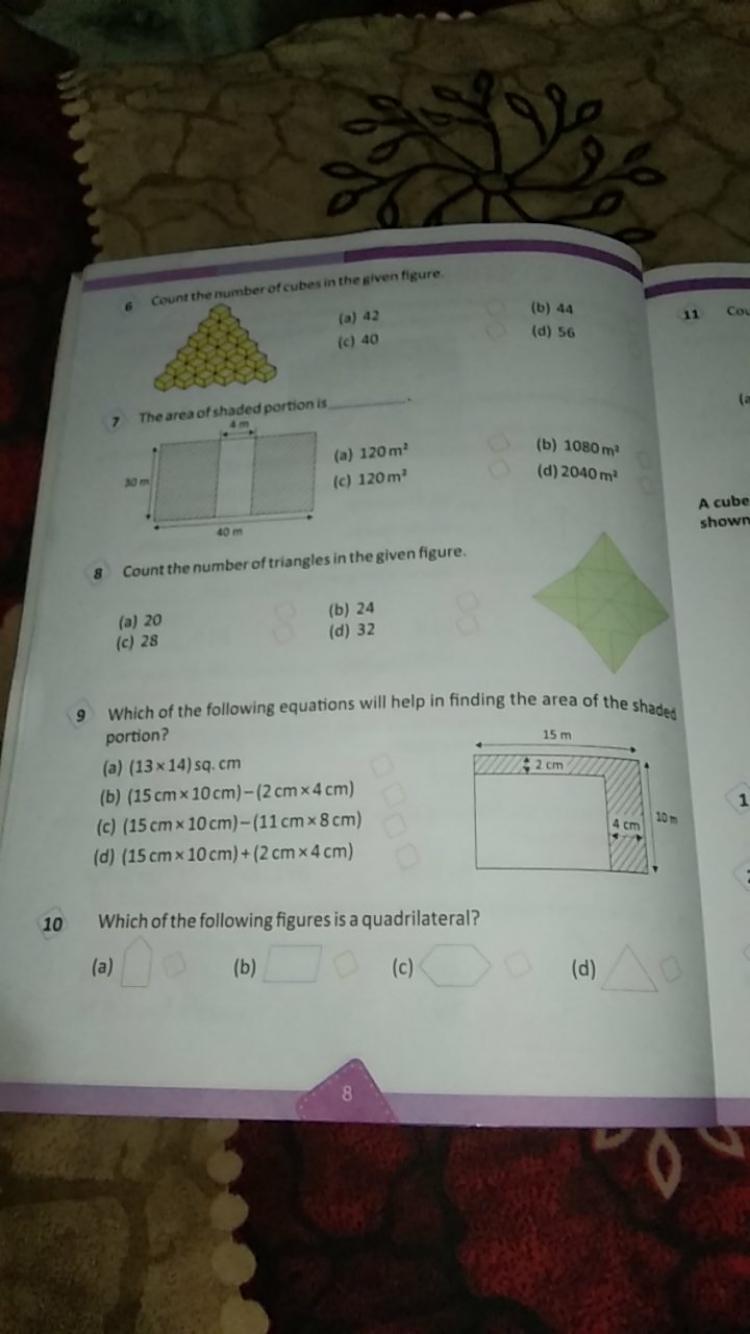 6 Count the number of cubes in the given figure.
(a) 42
(b) 44
7 The a