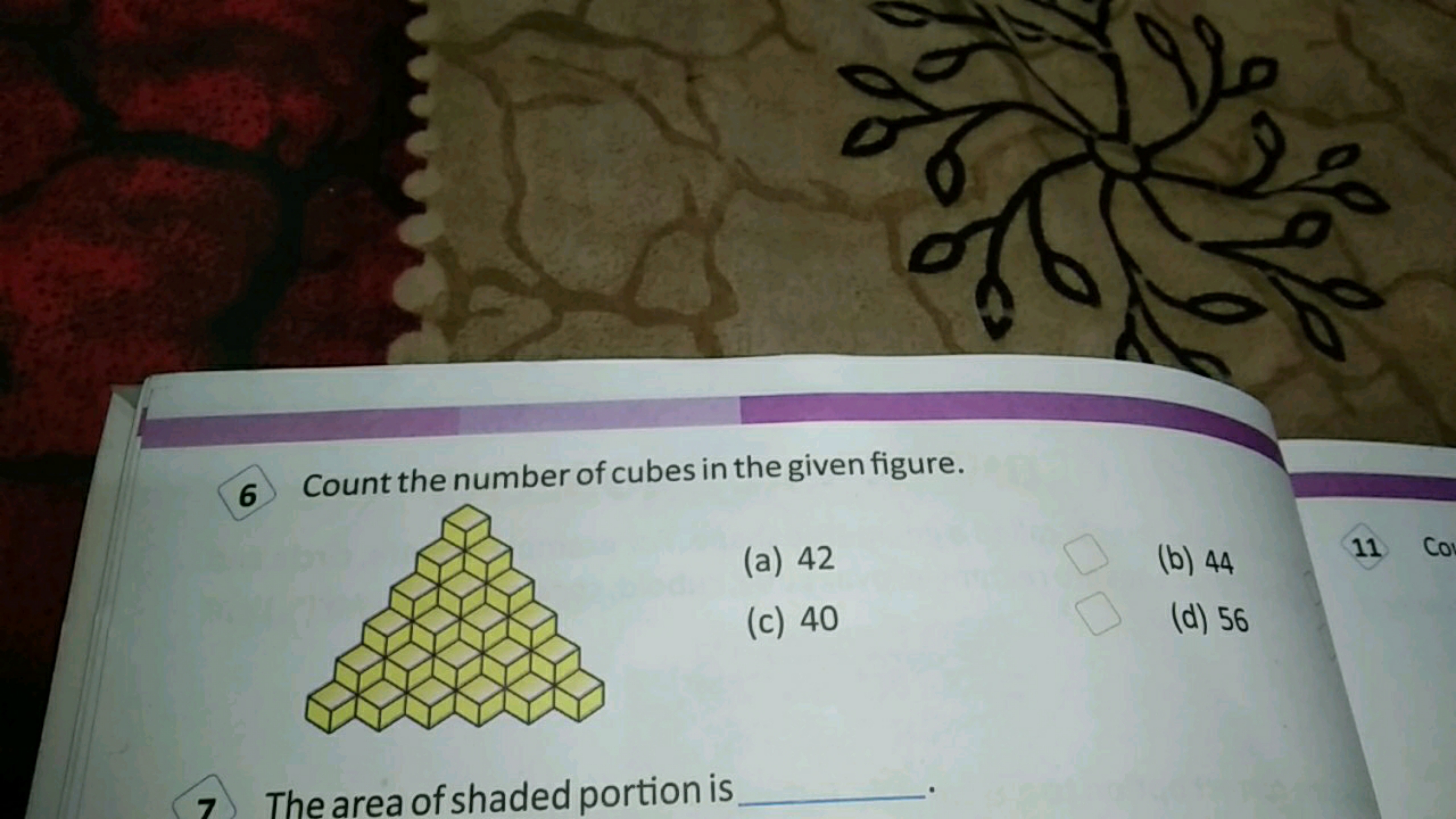 6 Count the number of cubes in the given figure.
(a) 42
(b) 44
(c) 40
