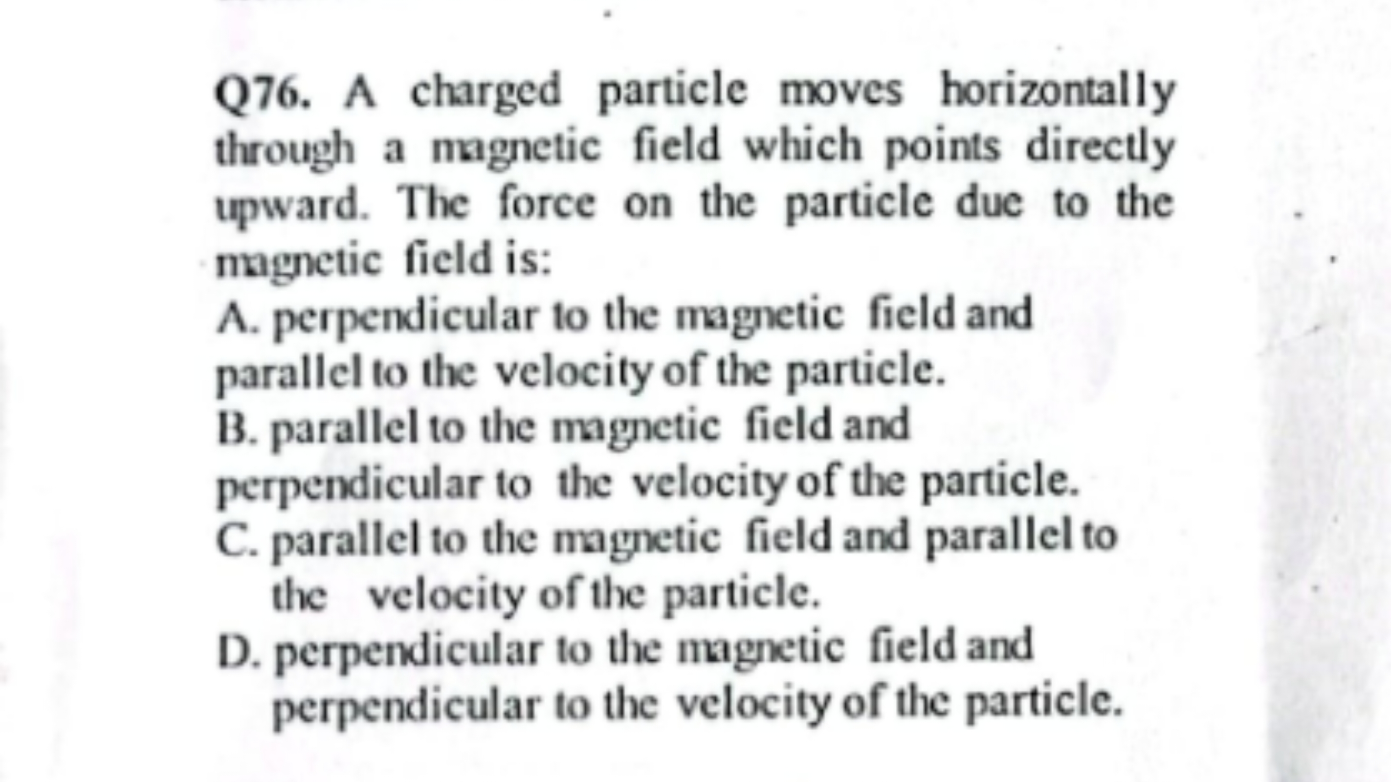 Q76. A charged particle moves horizontally through a magnetic field wh