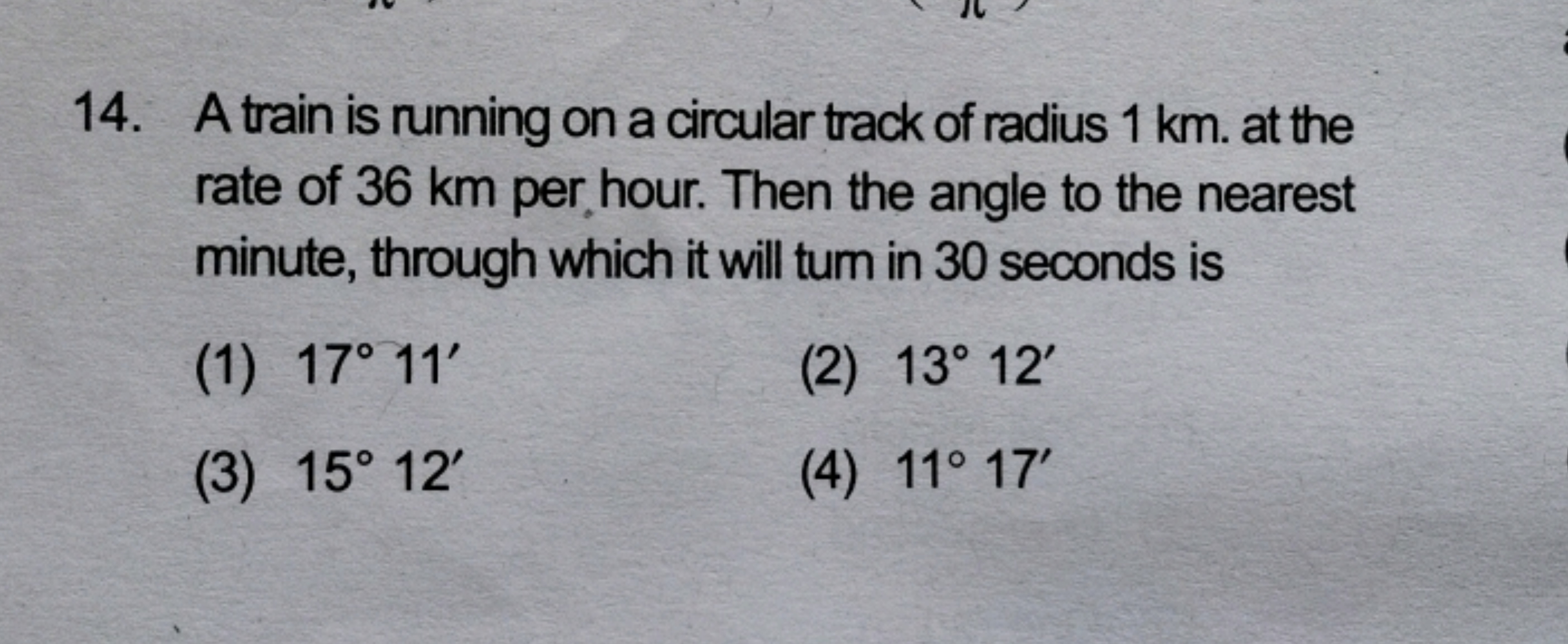 14. A train is running on a circular track of radius 1 km . at the rat