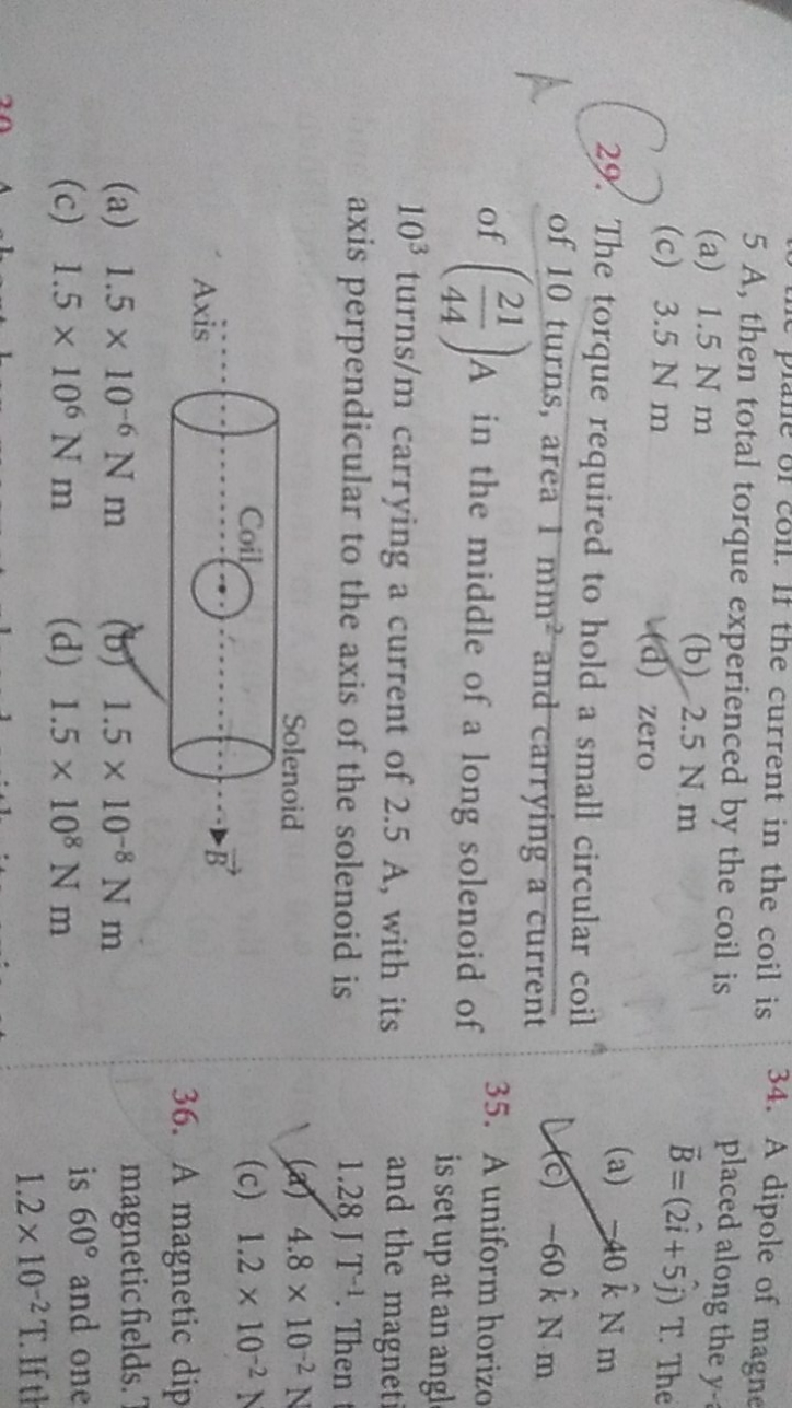 coll. If the current in the coil is 5 A , then total torque experience