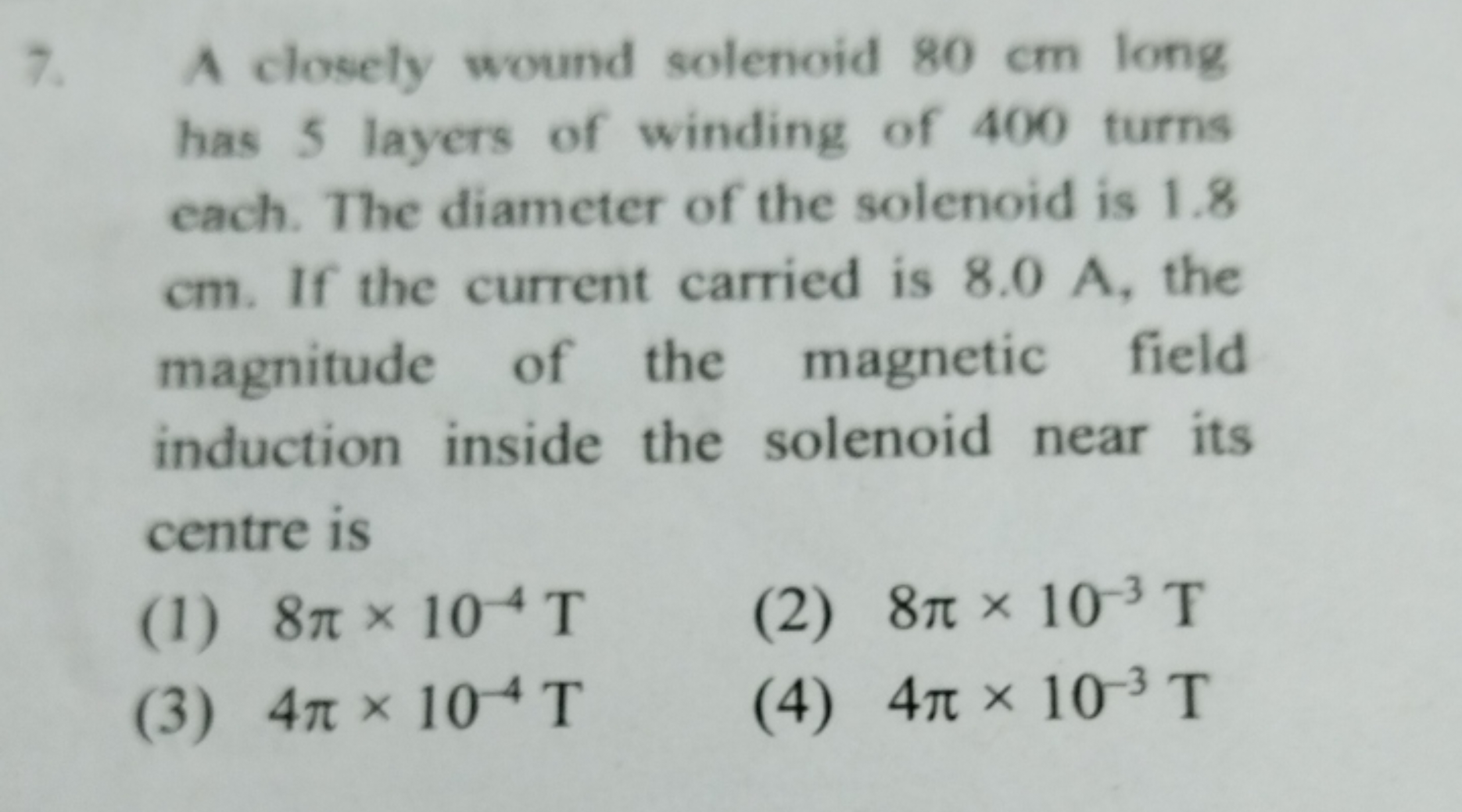 7. A closely wound solenoid 80 cm long has 5 layers of winding of 400 