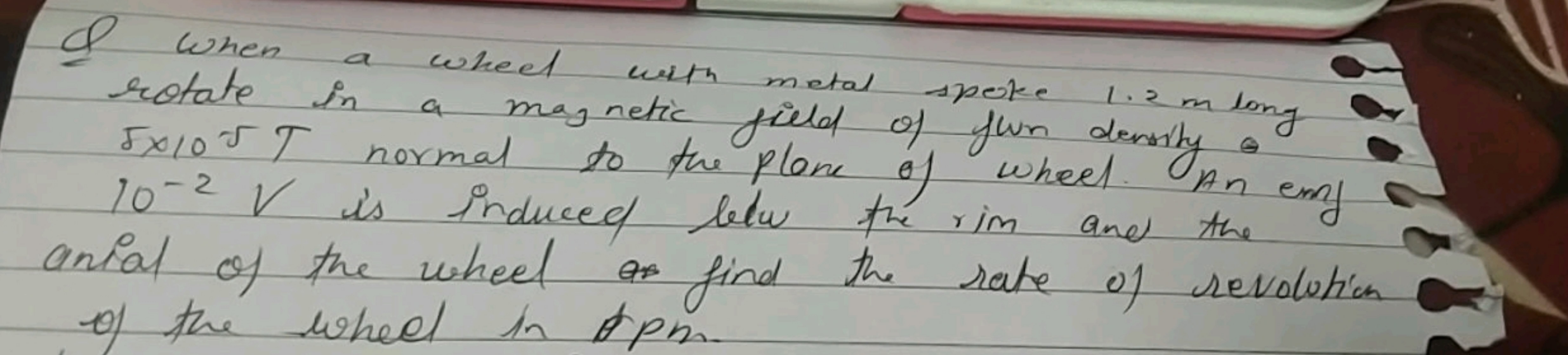 A) When a wheel with metal spoke 1.2 m long rotate in a magnetic field