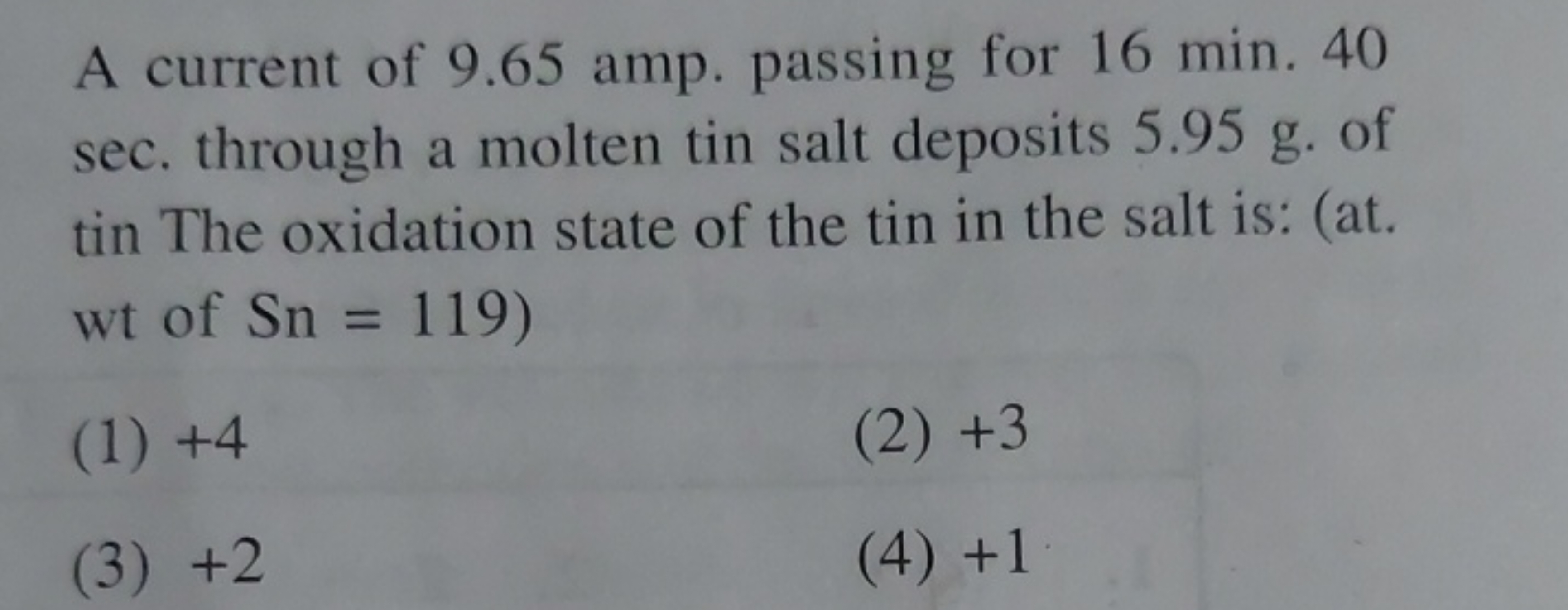 A current of 9.65 amp . passing for 16 min .40 sec . through a molten 