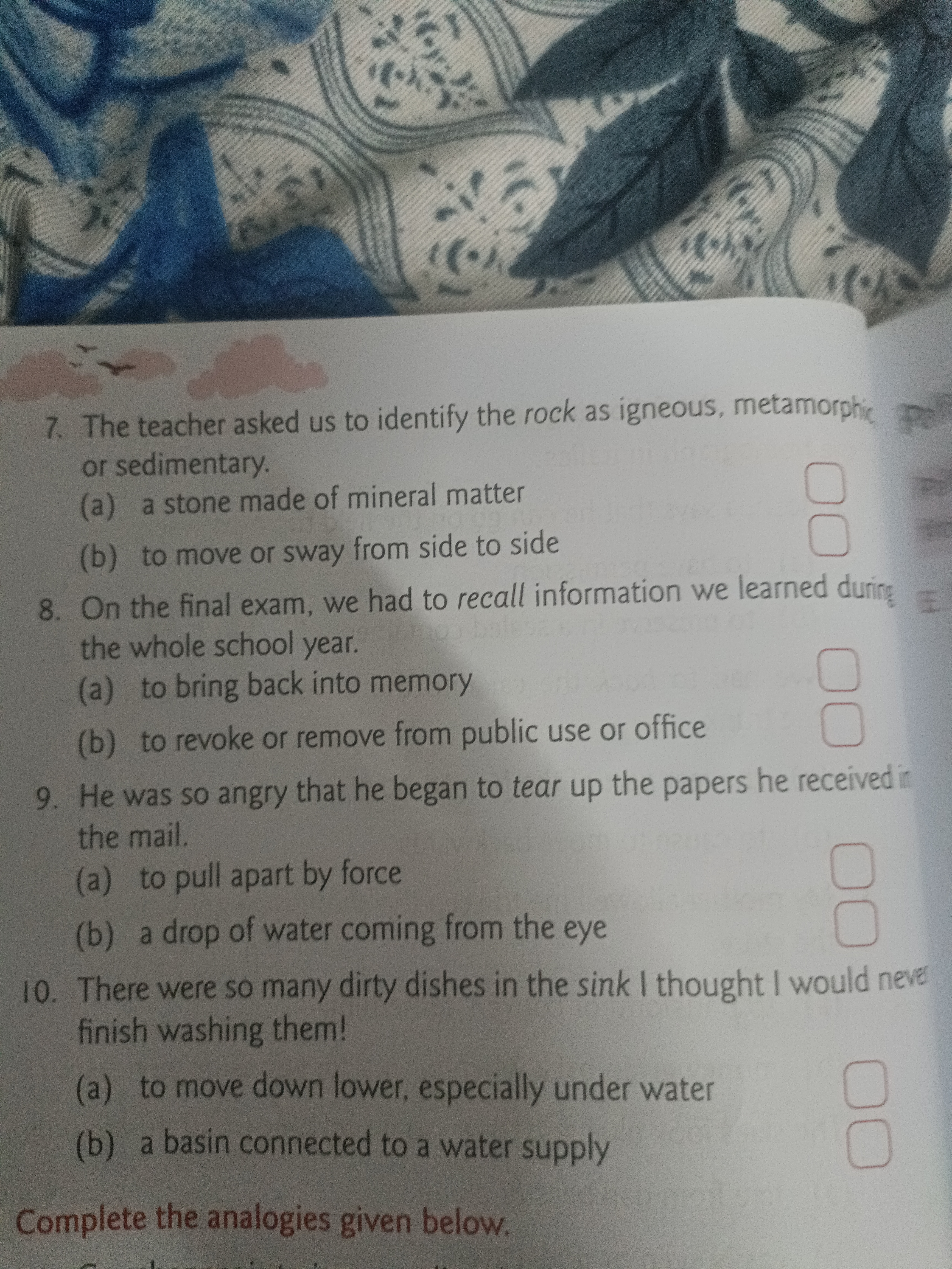 7. The teacher asked us to identify the rock as igneous, metamorphic o