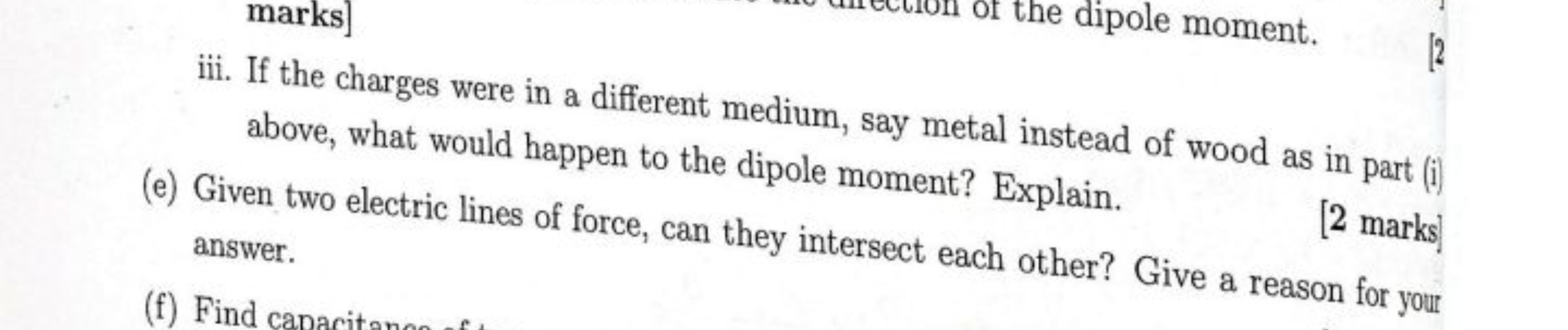 iii. If the charges were in a different medium, say metal instead of w