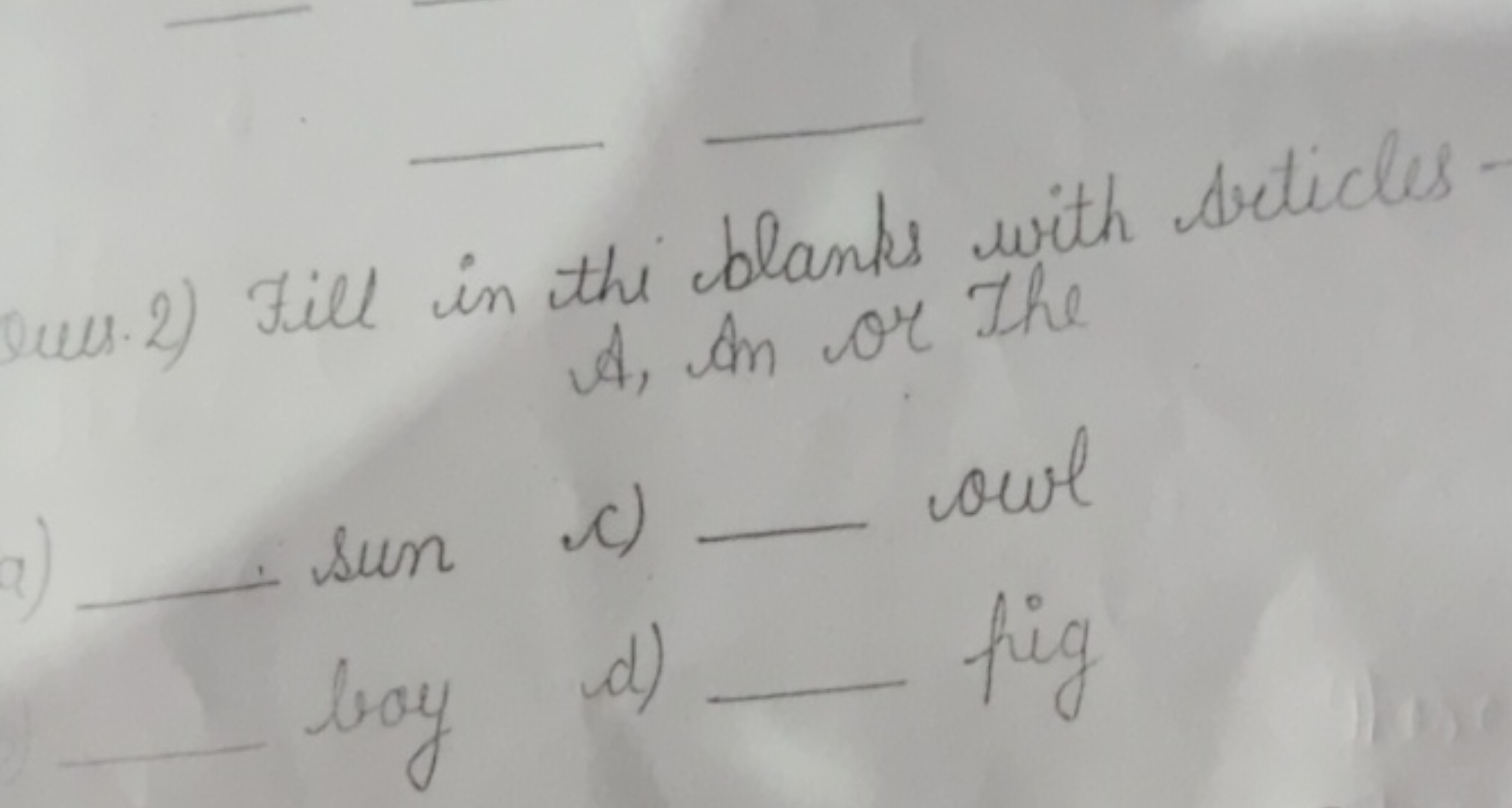 pees.2) Fill in the blanks with Articles.
A, An or the
a) 
sun
c)  owl