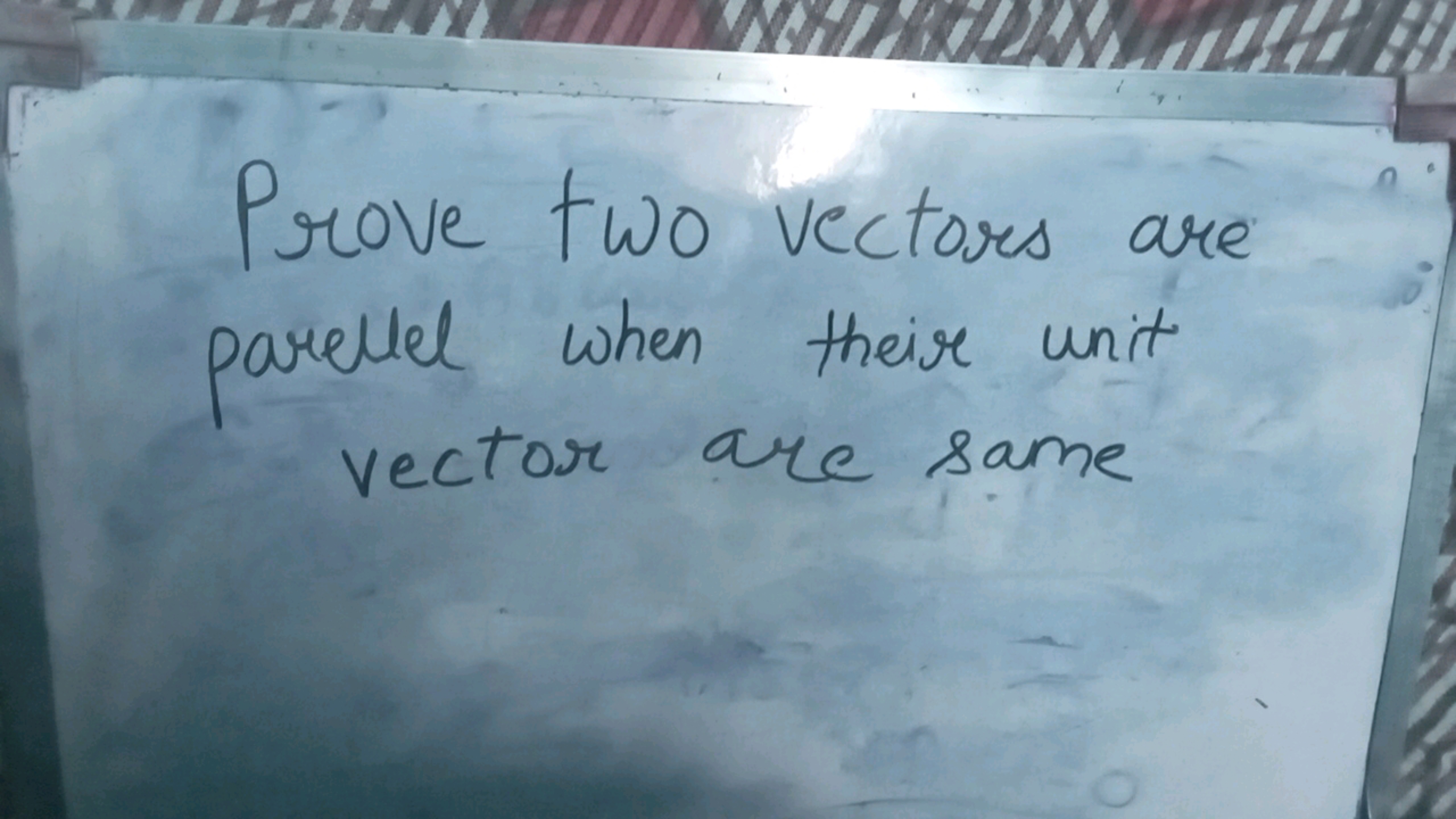 Prove two vectors are parallel when their unit vector are same