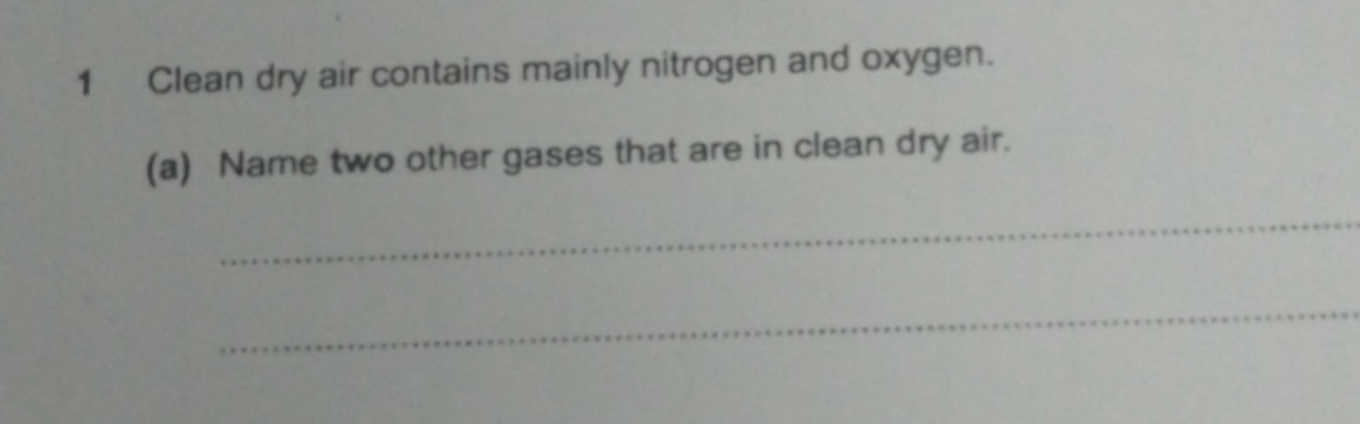 1 Clean dry air contains mainly nitrogen and oxygen.
(a) Name two othe