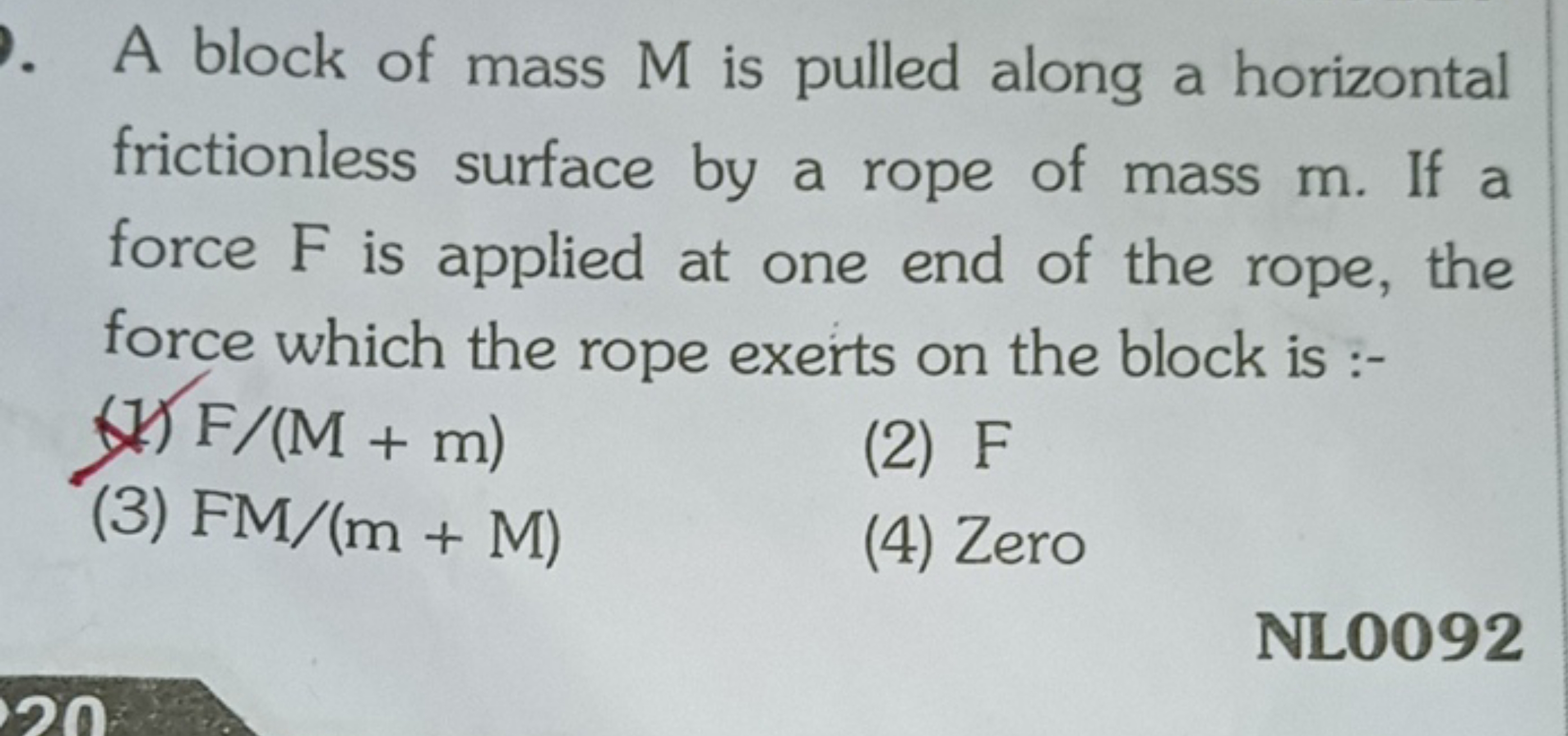 A block of mass M is pulled along a horizontal frictionless surface by