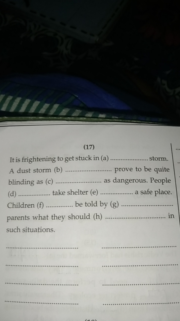 (17)

It is frightening to get stuck in (a) storm.

A dust storm (b) 
