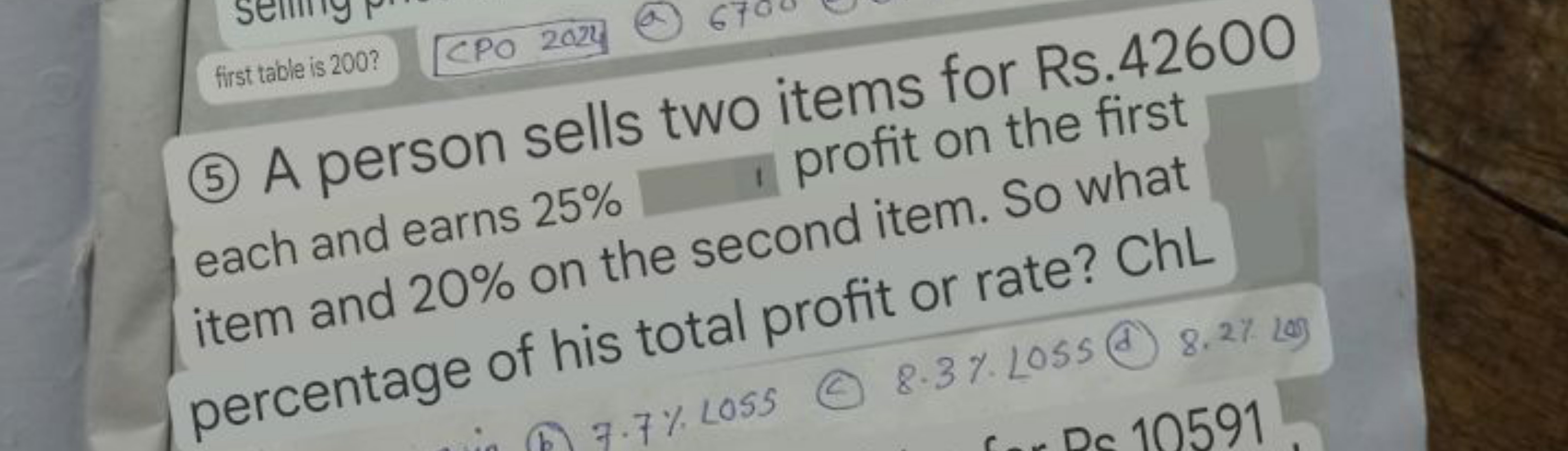 (5) A person sells two items for Rs. 42600 each and earns 25% profit o