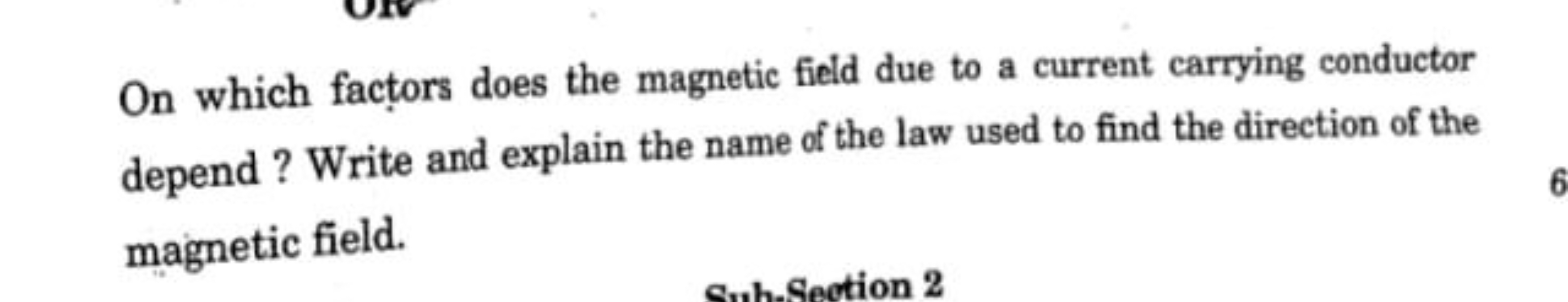 On which factors does the magnetic field due to a current carrying con