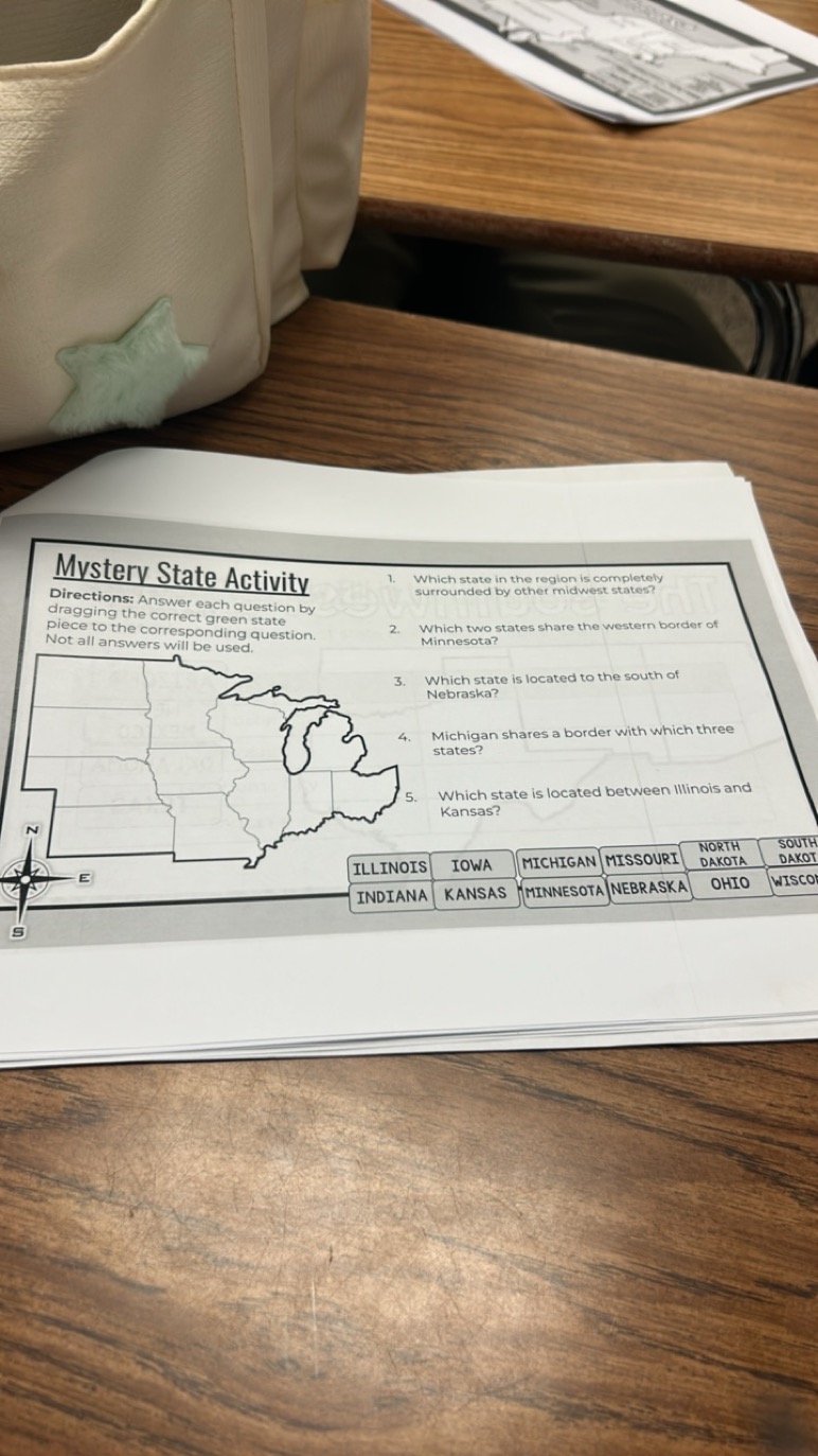 Mystery State Activity
1. Which state in the region is completely

Dir