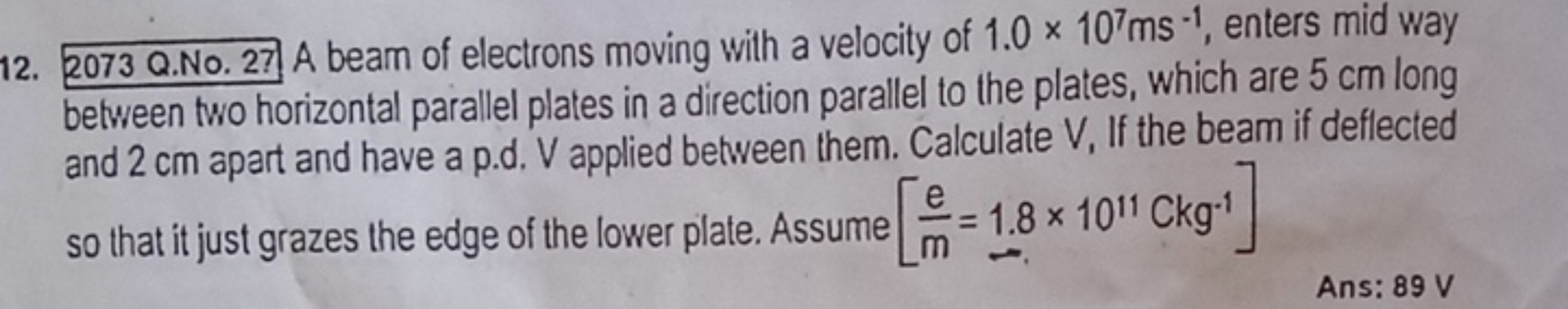 12. 2073 Q.No. 27 A beam of electrons moving with a velocity of 1.0×10