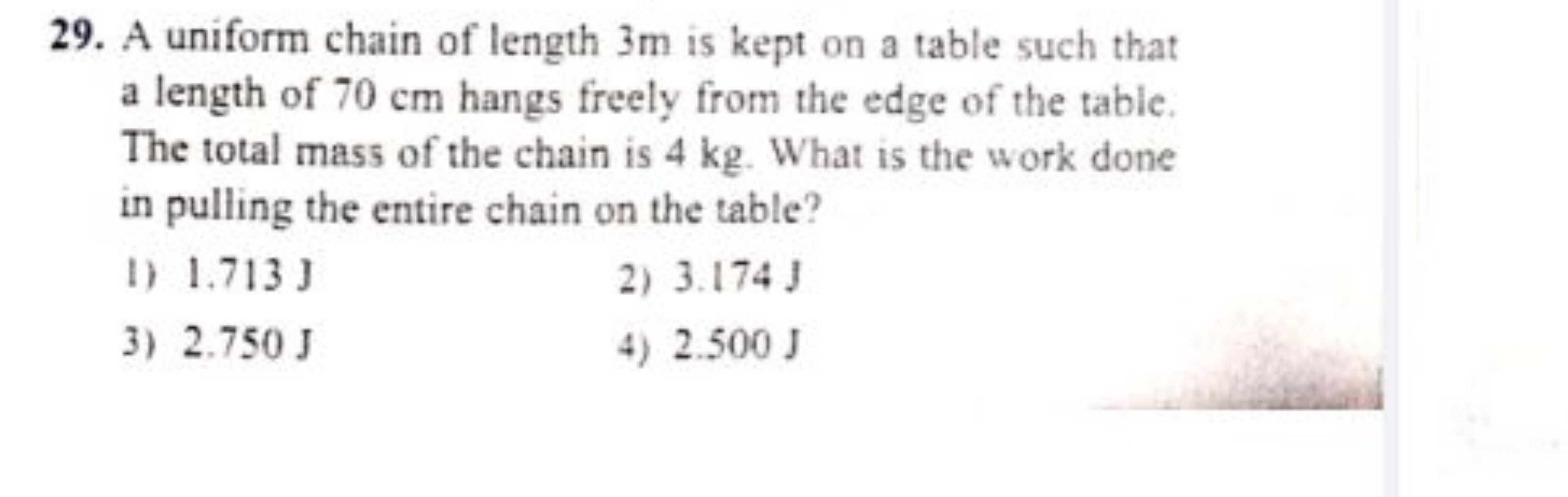 29. A uniform chain of length 3 m is kept on a table such that a lengt