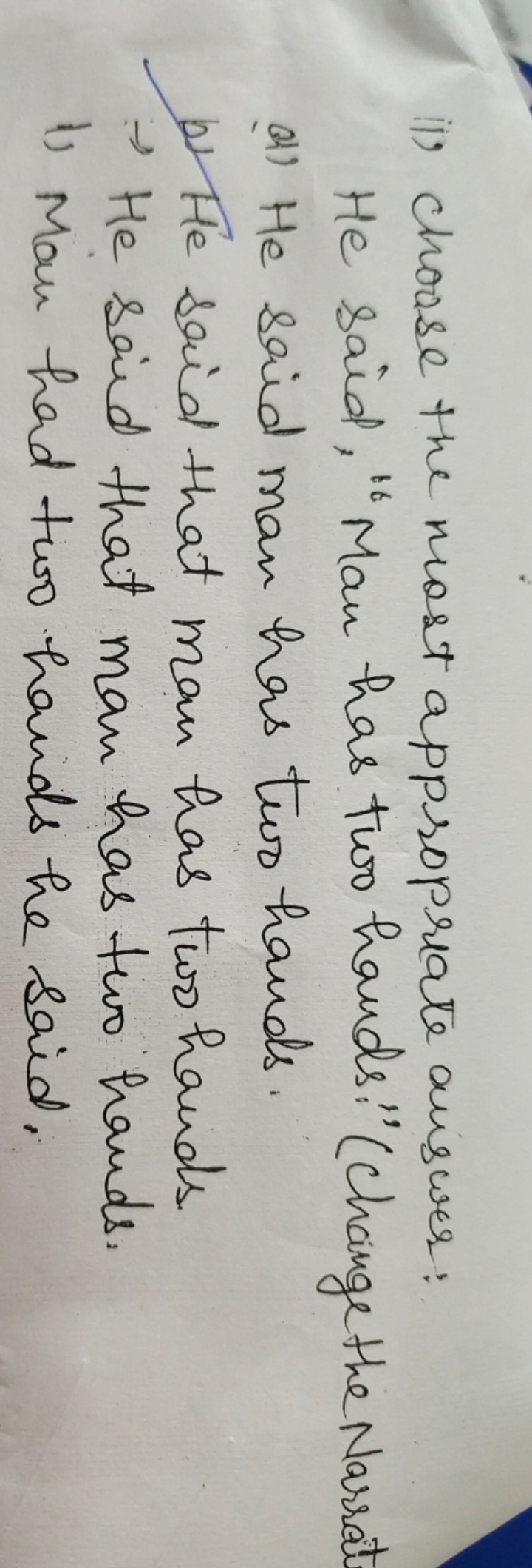 i) Choose the most appropriate answer:

He said, "Man has two hands:" 