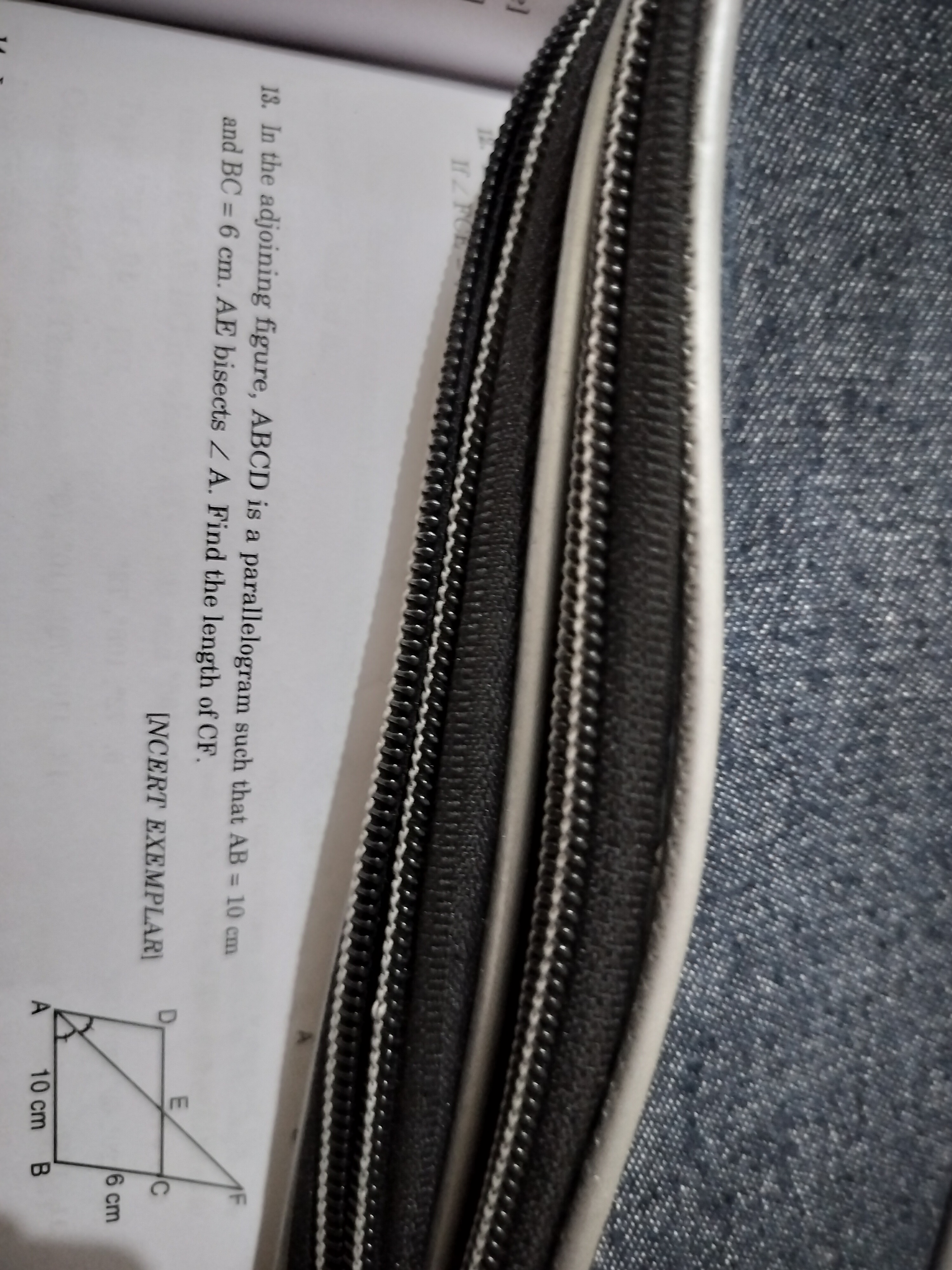 18. In the adjoining figure, ABCD is a parallelogram such that AB=10 c