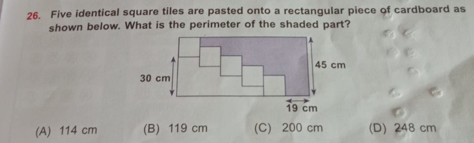 26. Five identical square tiles are pasted onto a rectangular piece of