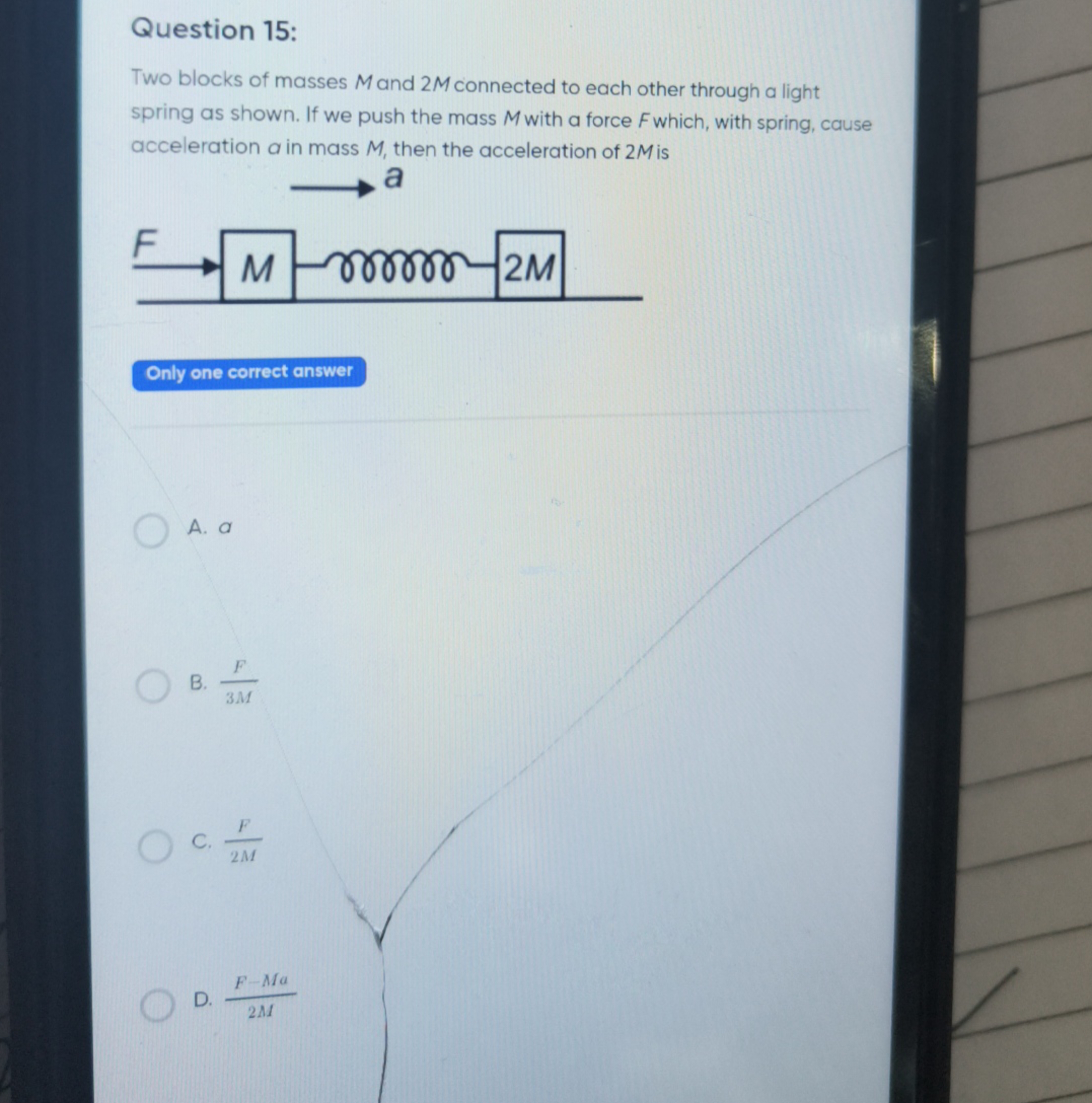 Question 15:
Two blocks of masses M and 2M connected to each other thr