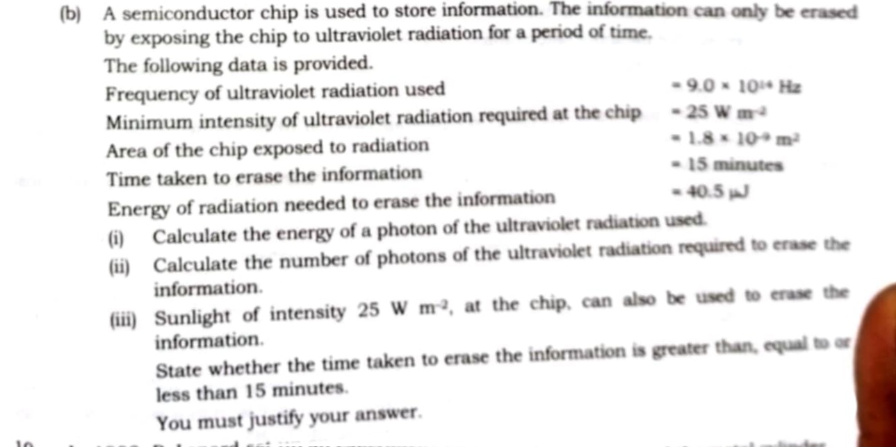 (b) A semiconductor chip is used to store information. The information