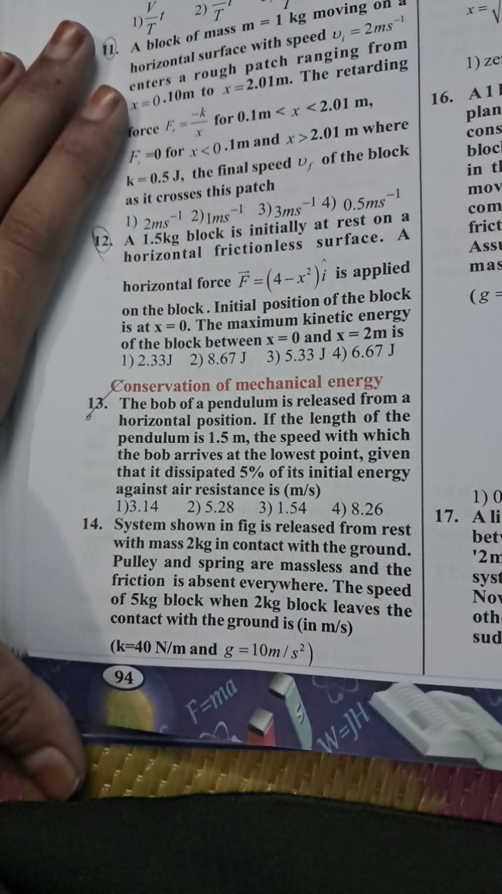 11. A block of mass m=1 kg moving on a horizontal surface with speed v