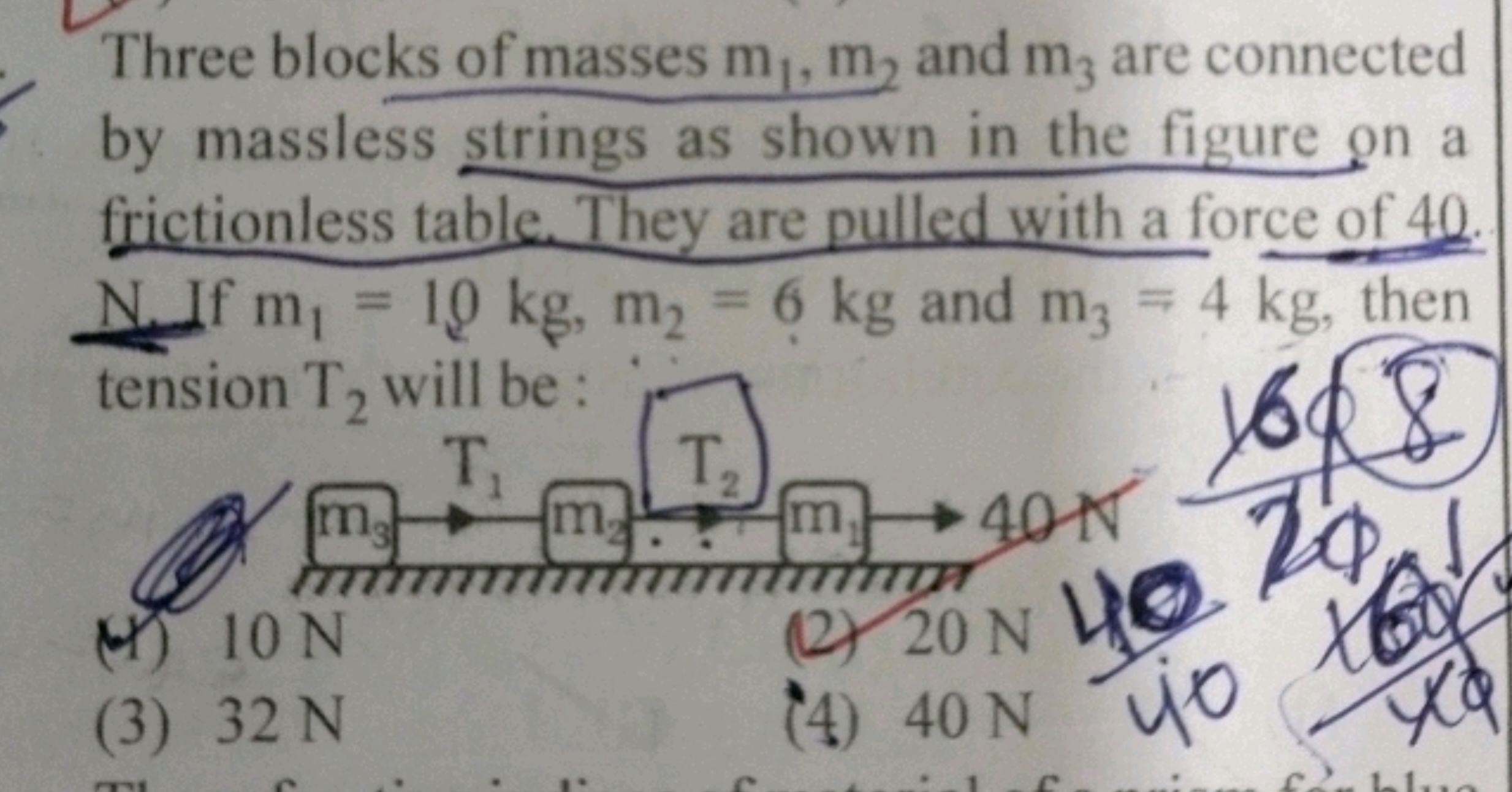 Three blocks of masses m1​, m2​ and m3​ are connected by massless stri