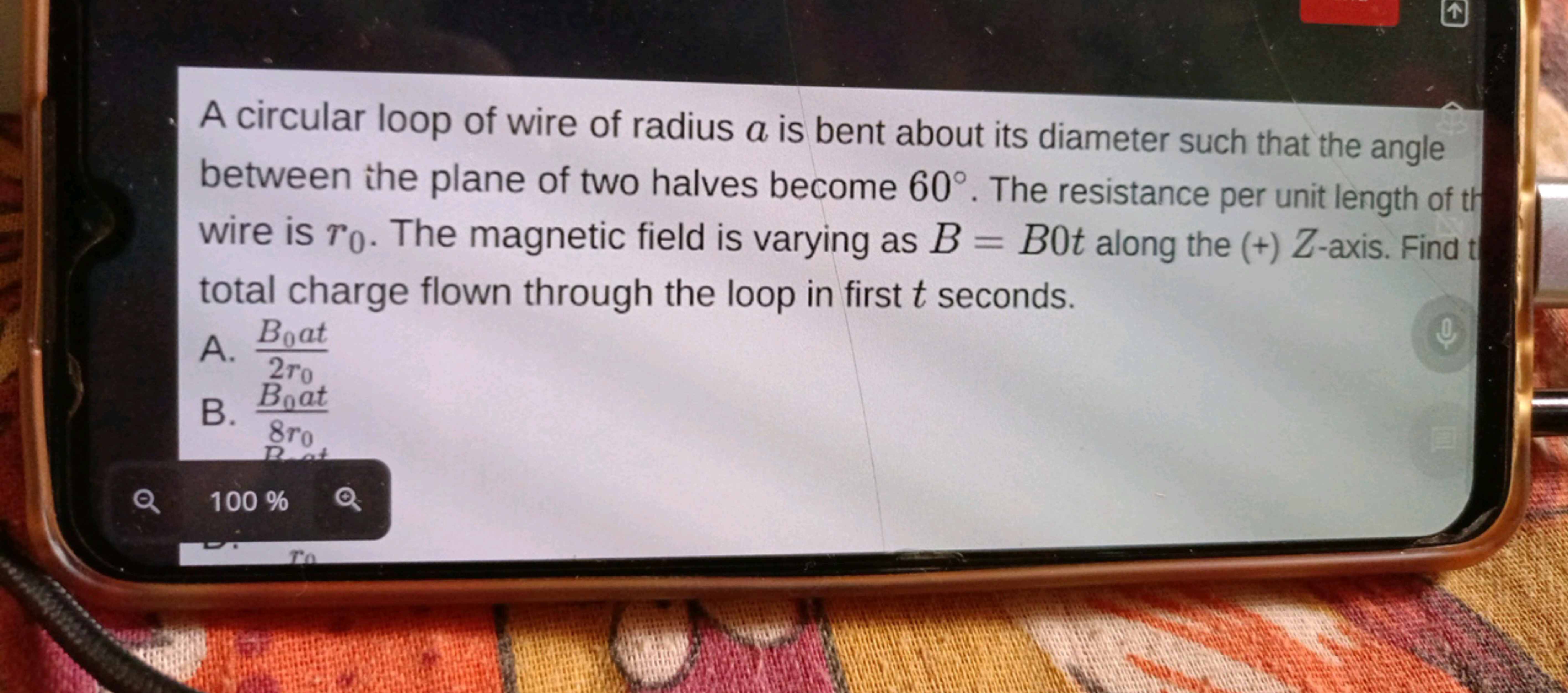 A circular loop of wire of radius a is bent about its diameter such th