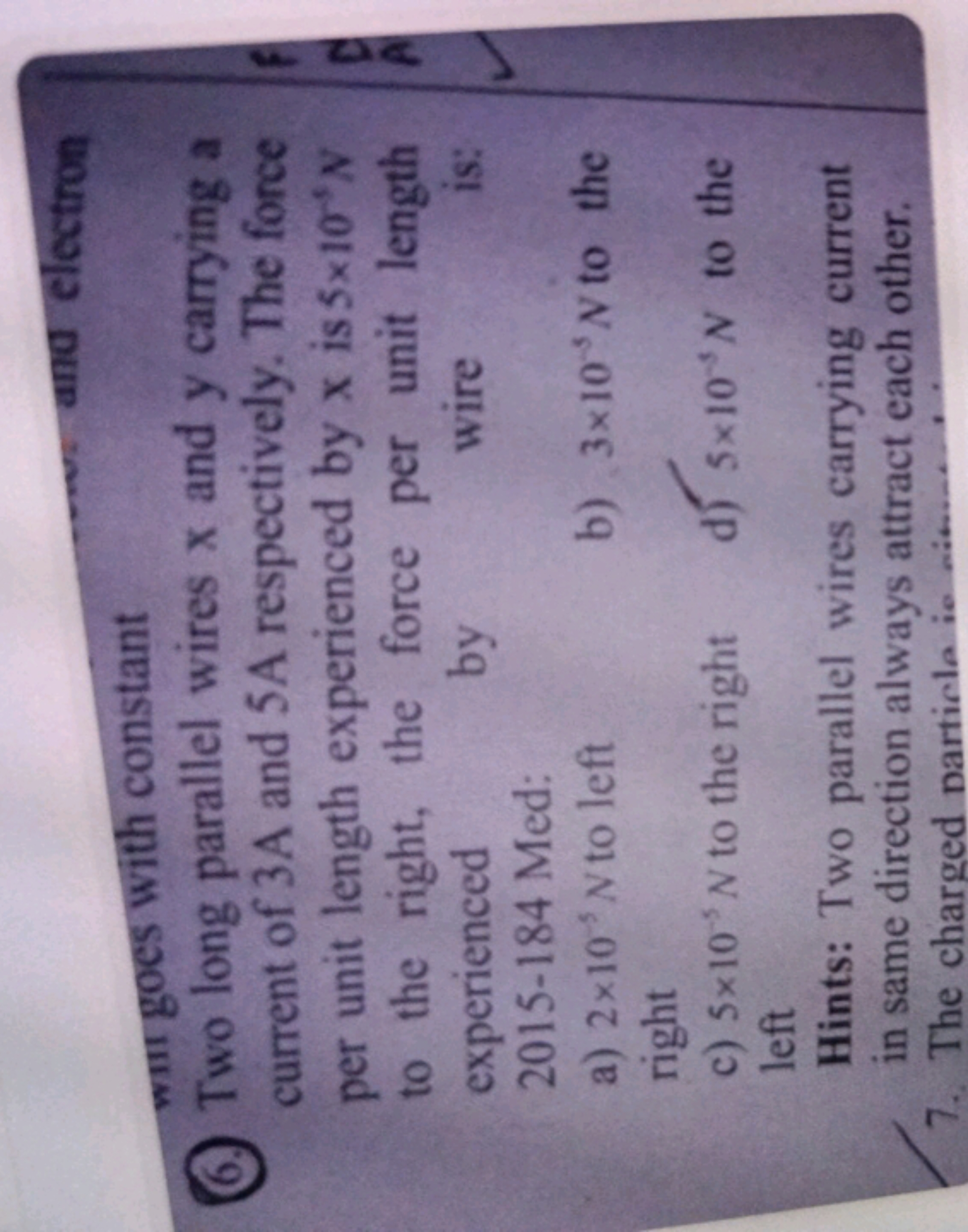 6. Two long parallel wires x and y carrying a current of 3A and 5A res