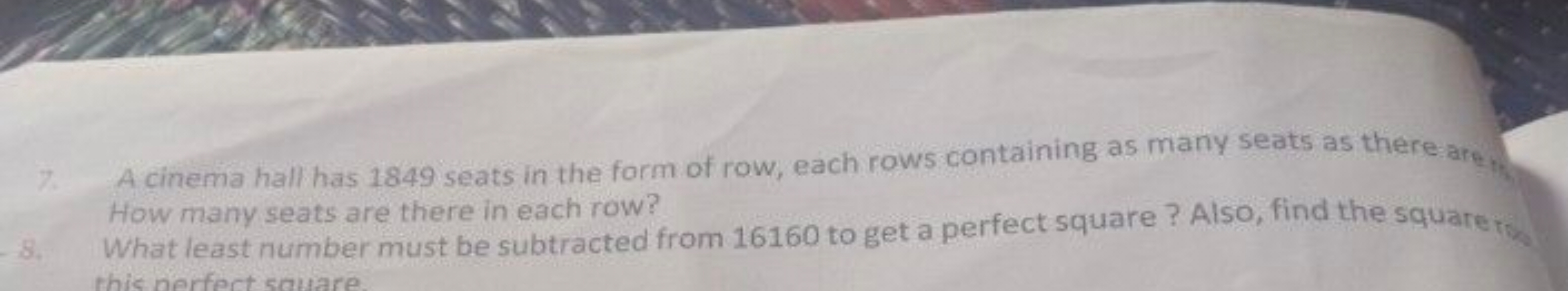 7. A cinema hall has 1849 seats in the form of row, each rows containi