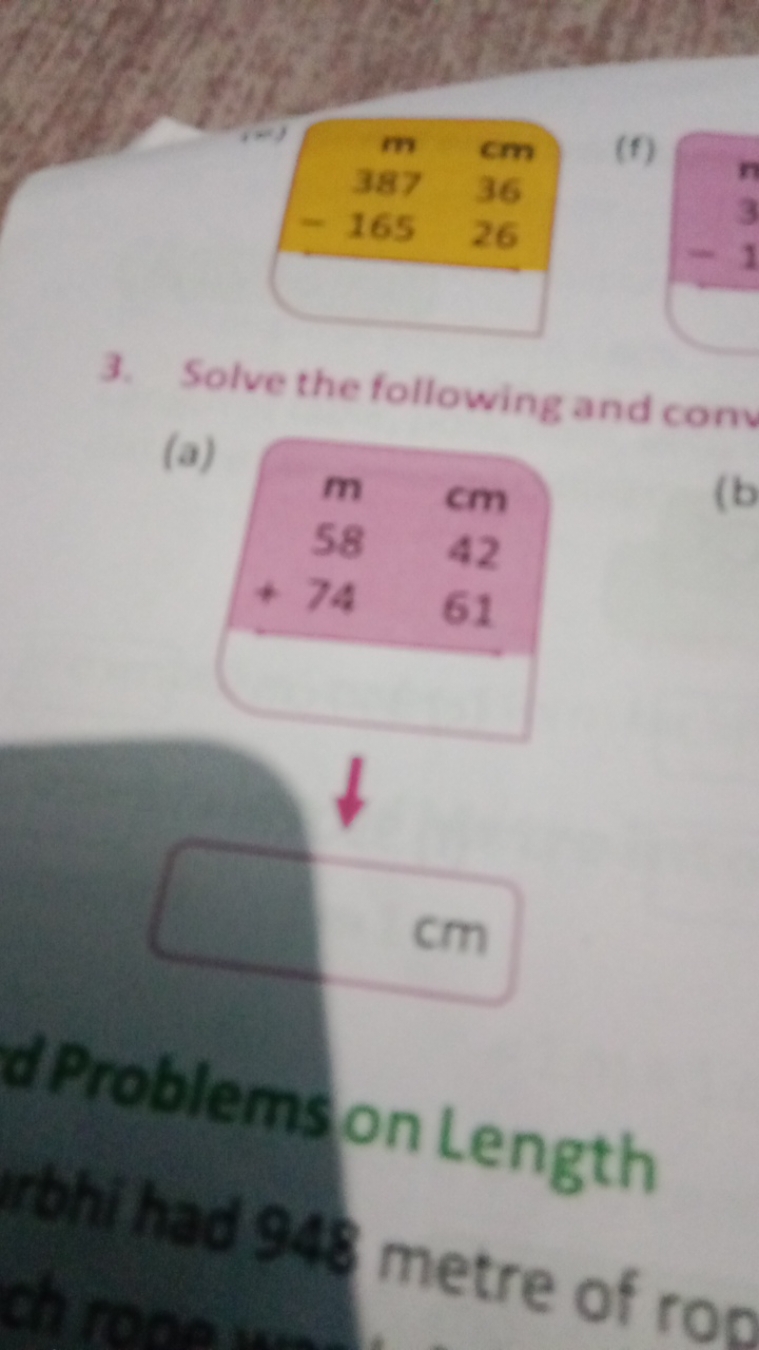 \begin{tabular} { r r } 
m & cm \\
387 & 36 \\
- 165 & 26 \\
\hline & 