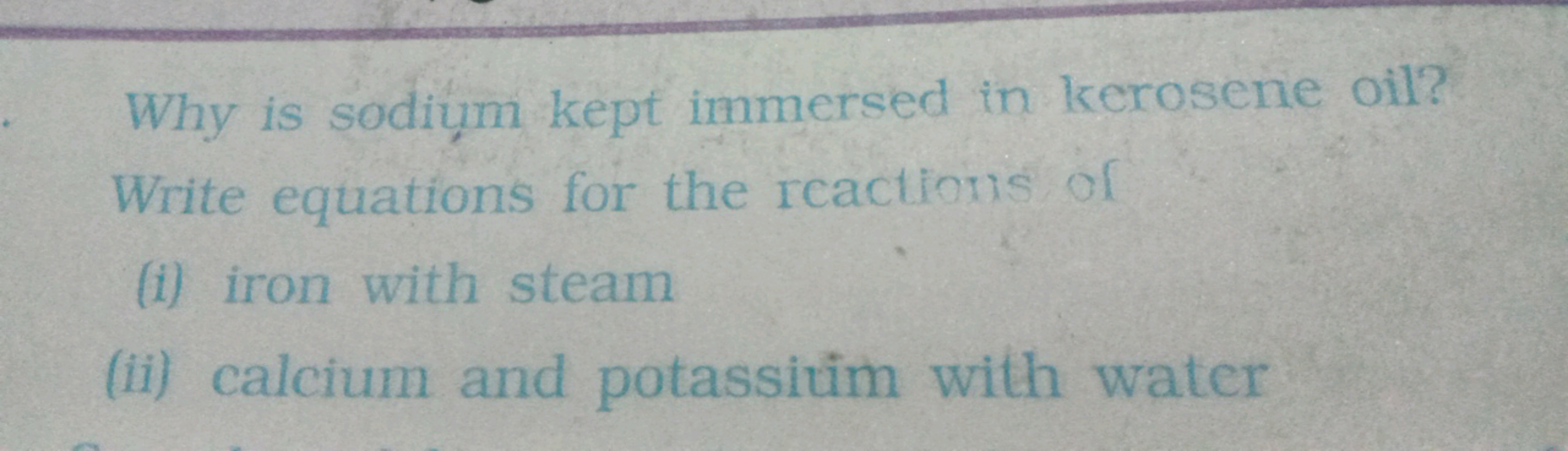 Why is sodium kept immersed in kerosene oil? Write equations for the r