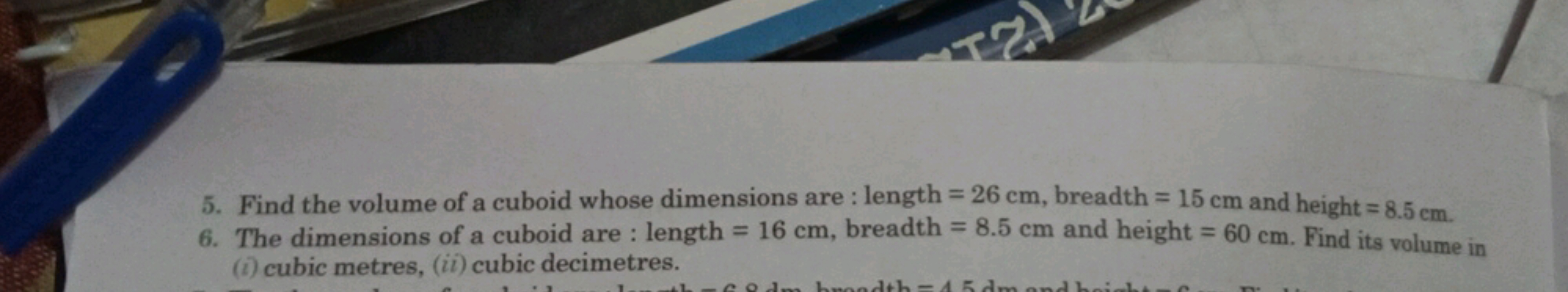 5. Find the volume of a cuboid whose dimensions are : length =26 cm, b