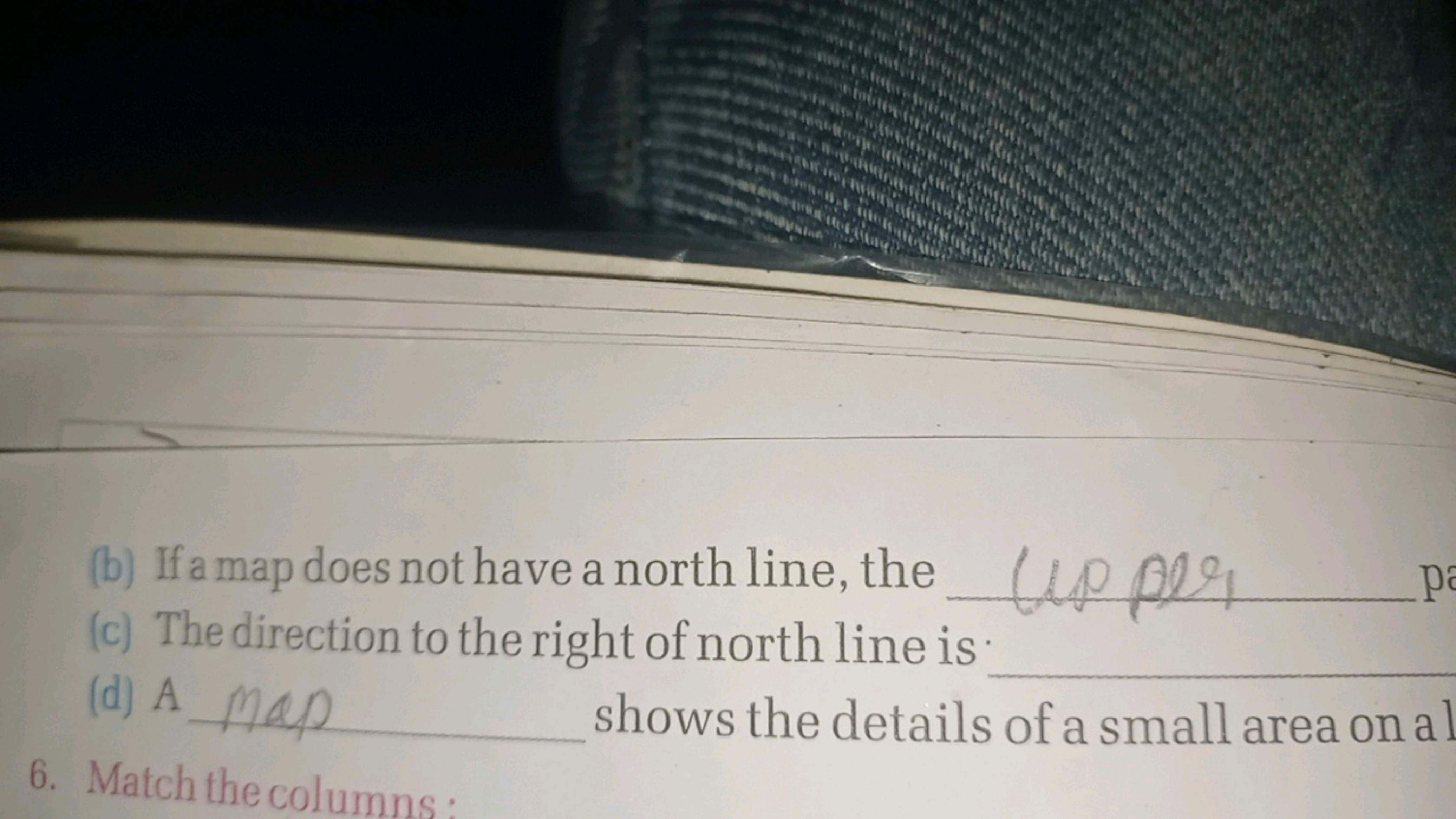 (b) If a map does not have a north line, the  (upper  pi
(c) The direc