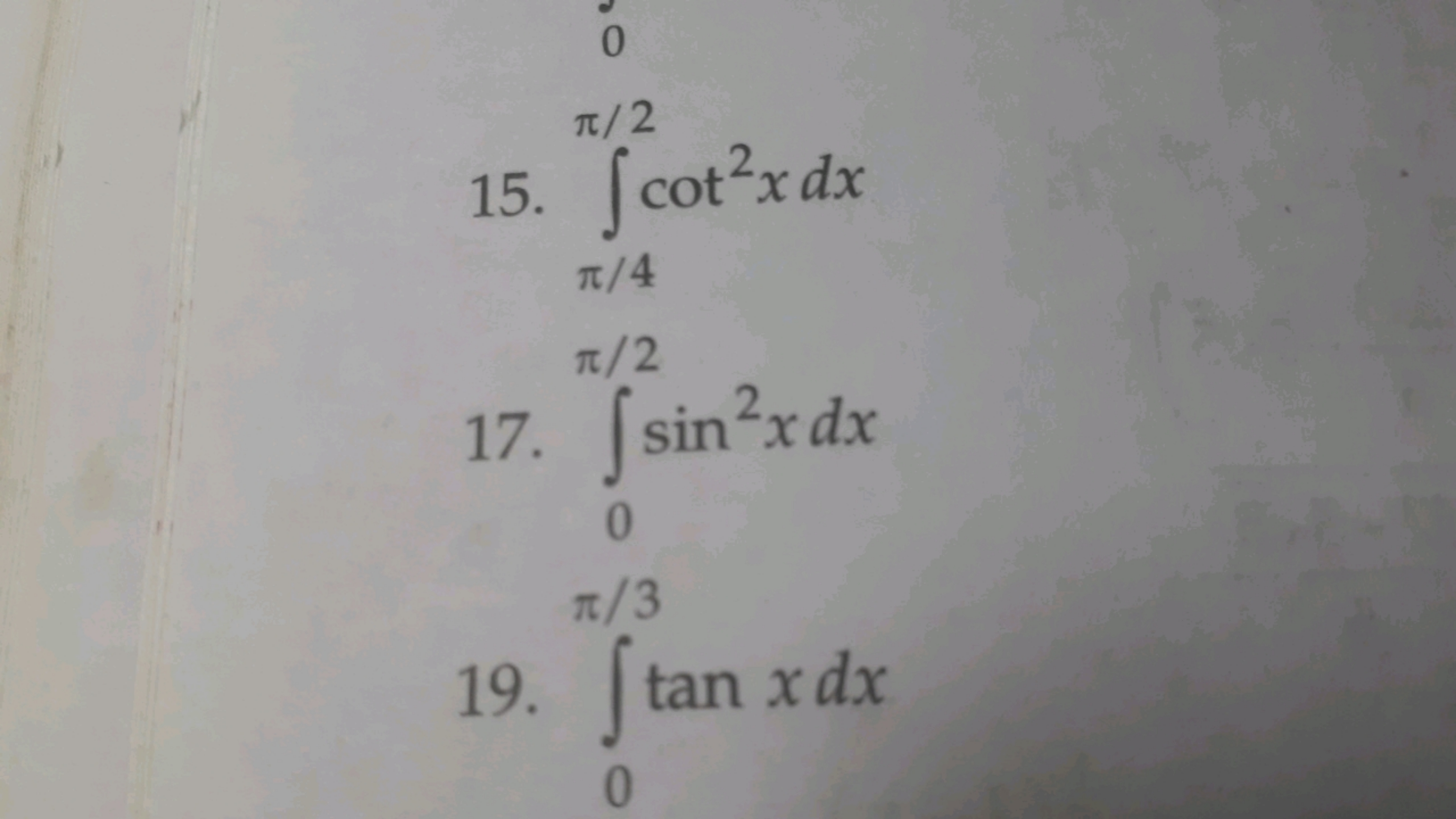 15. ∫π/4π/2​cot2xdx
17. ∫0π/2​sin2xdx
19. ∫0π/3​tanxdx