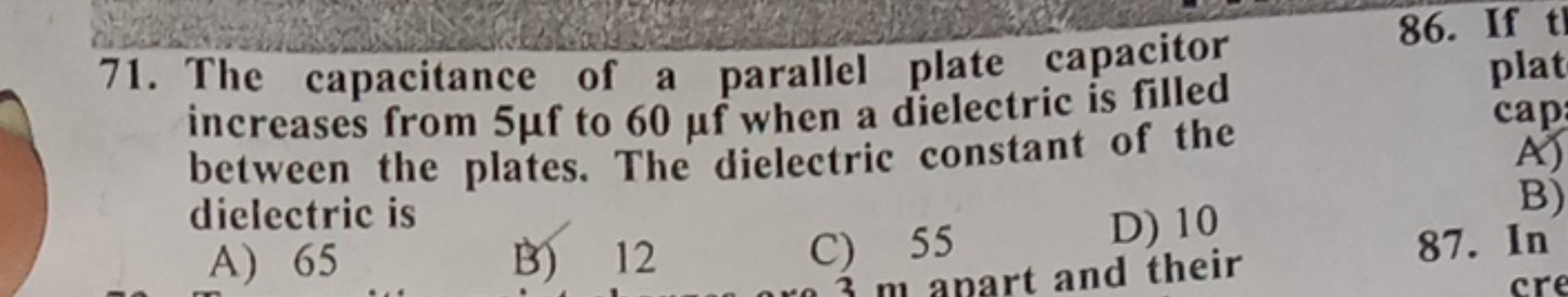 71. The capacitance of a parallel plate capacitor increases from 5μf t