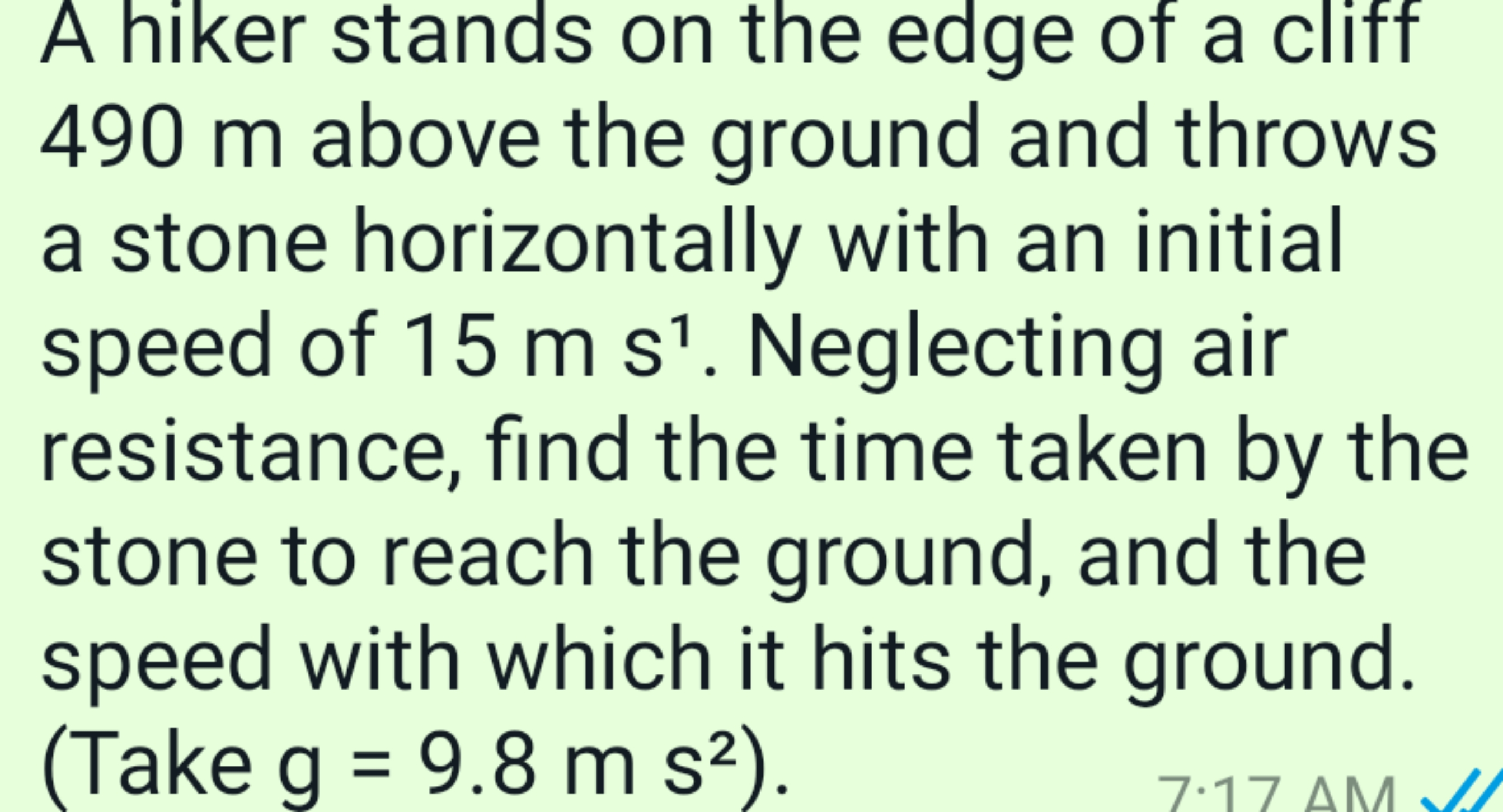 A hiker stands on the edge of a cliff 490 m above the ground and throw