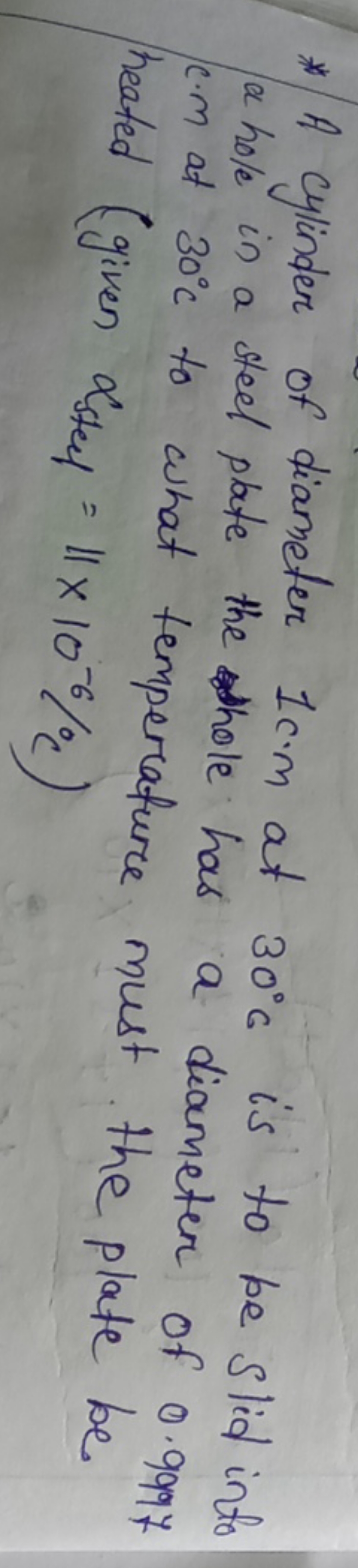 * A cylinder of diameter 1 cm at 30∘C is to be slid into a hole in a s