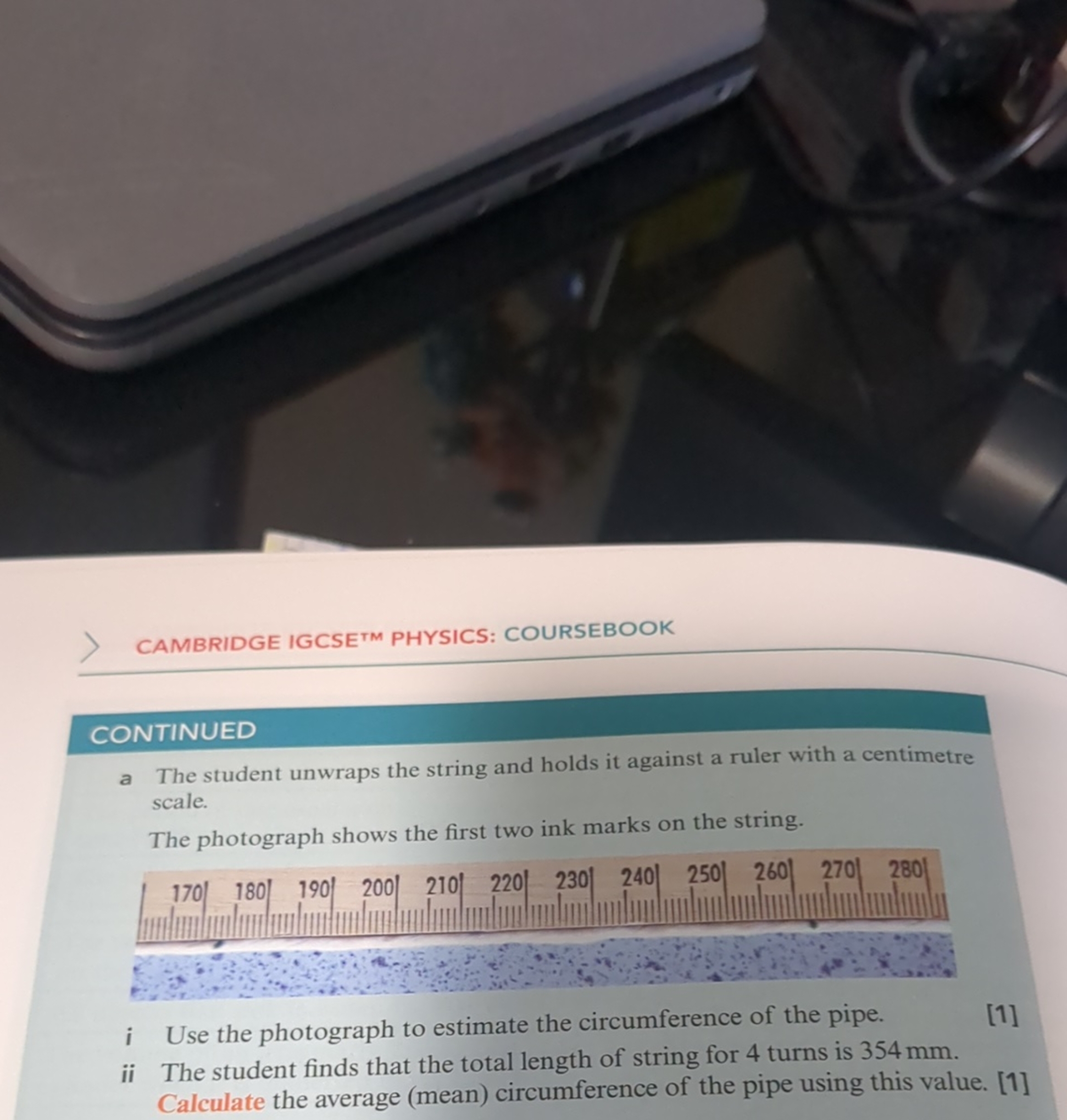 CAMBRIDGE IGCSE TM PHYSICS: COURSEBOOK

CONTINUED
a The student unwrap