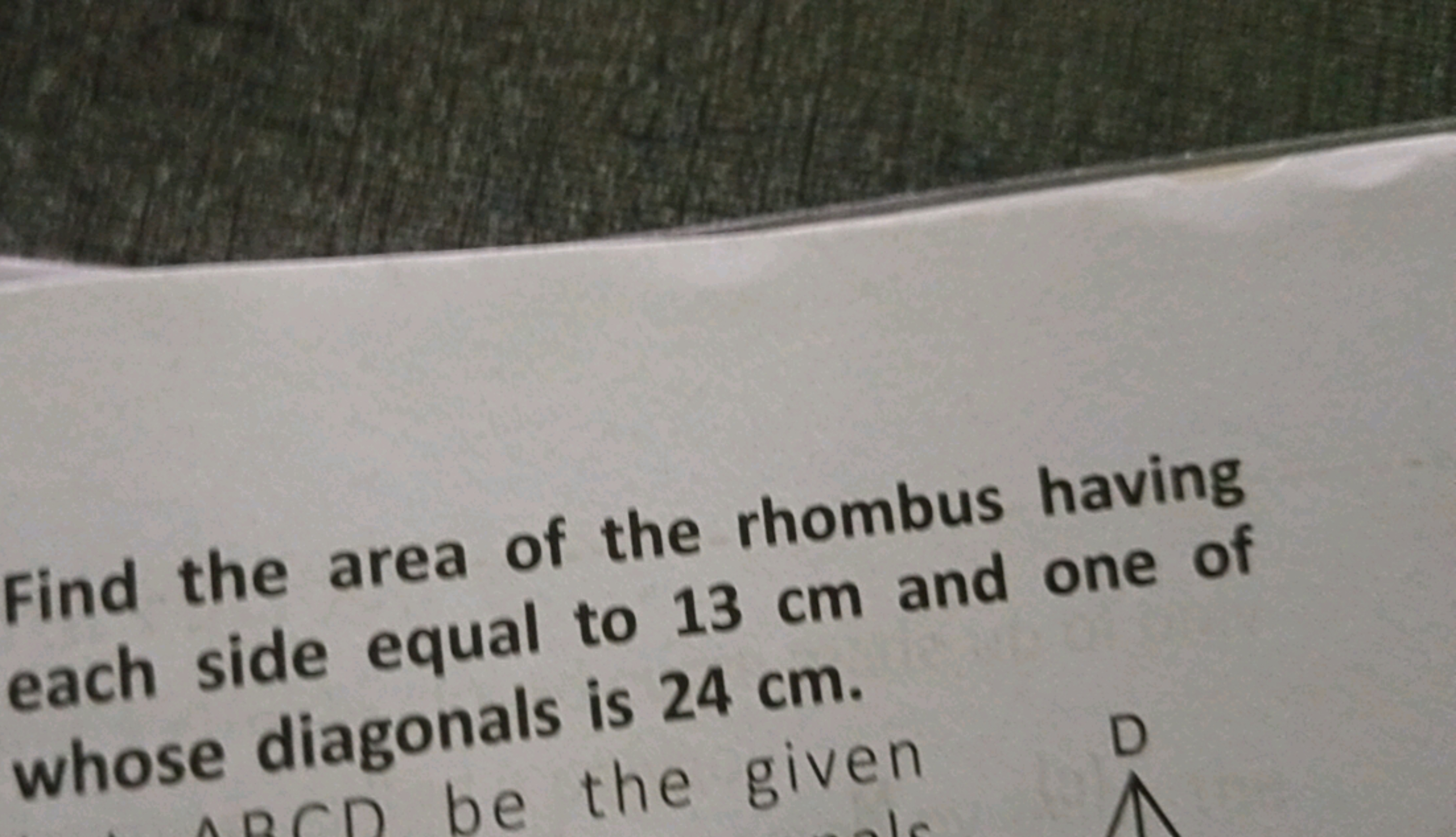 Find the area of the rhombus having each side equal to 13 cm and one o