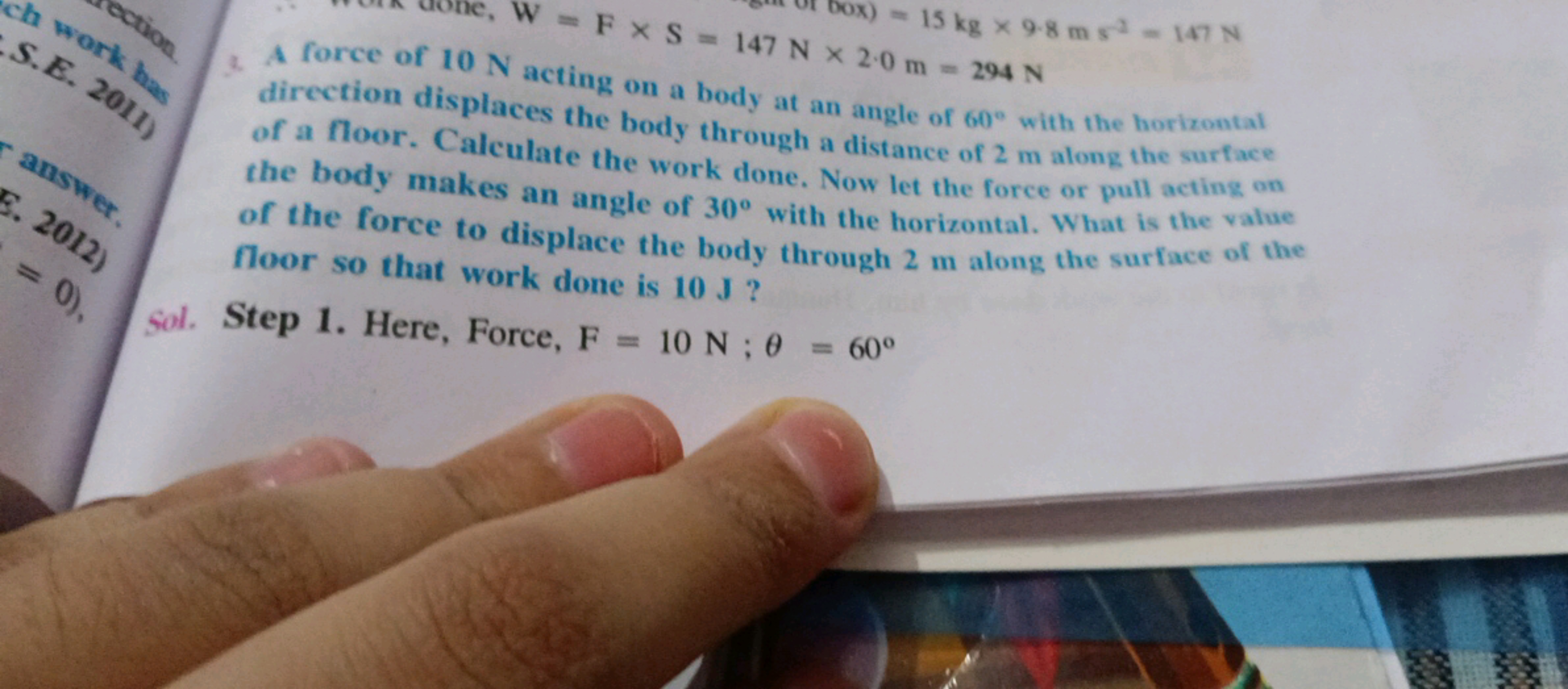 direction displaces the body through a distance of 2 m along the surfa