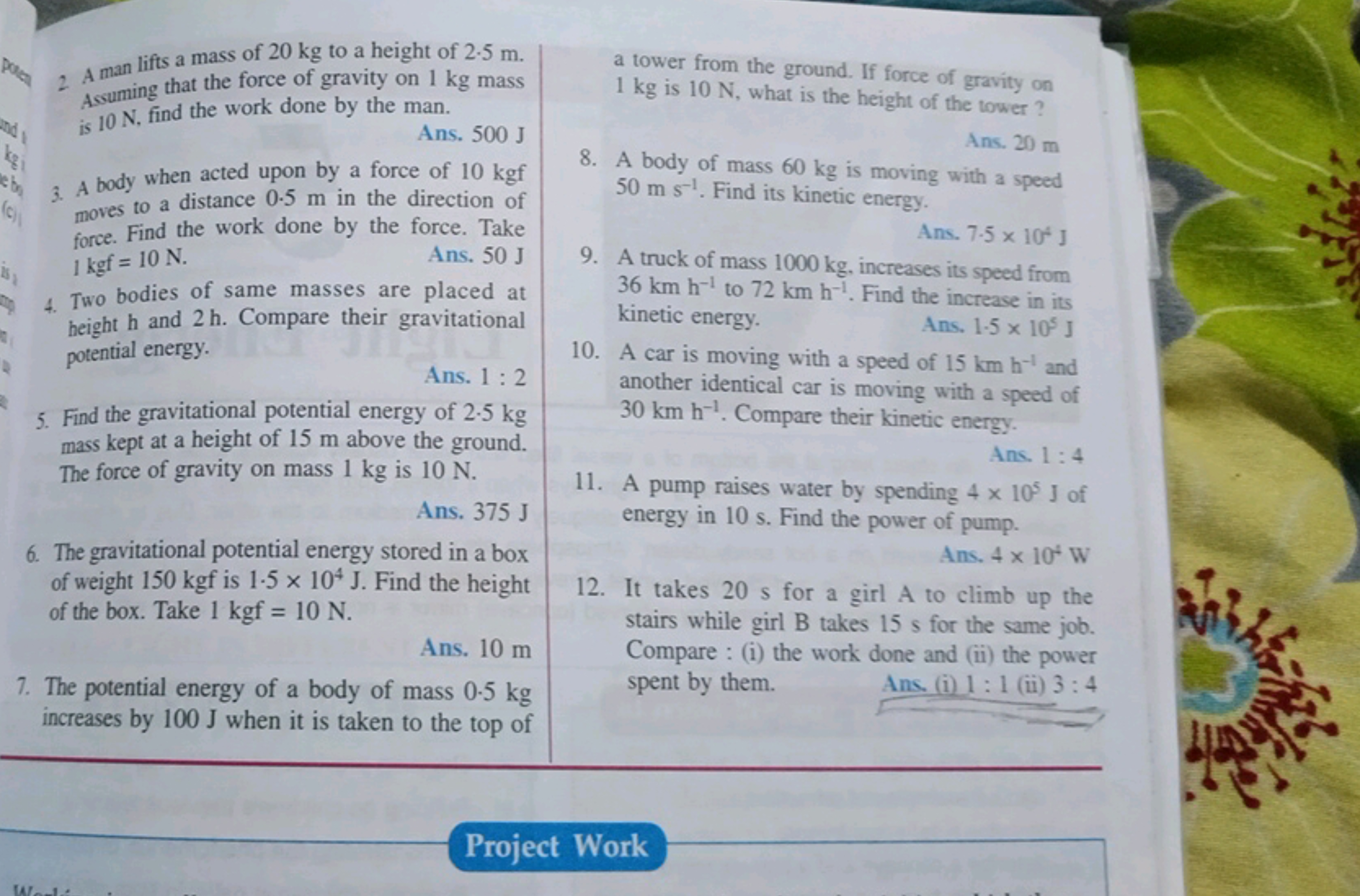 2. A man lifts a mass of 20 kg to a height of 2.5 m . Assuming that th