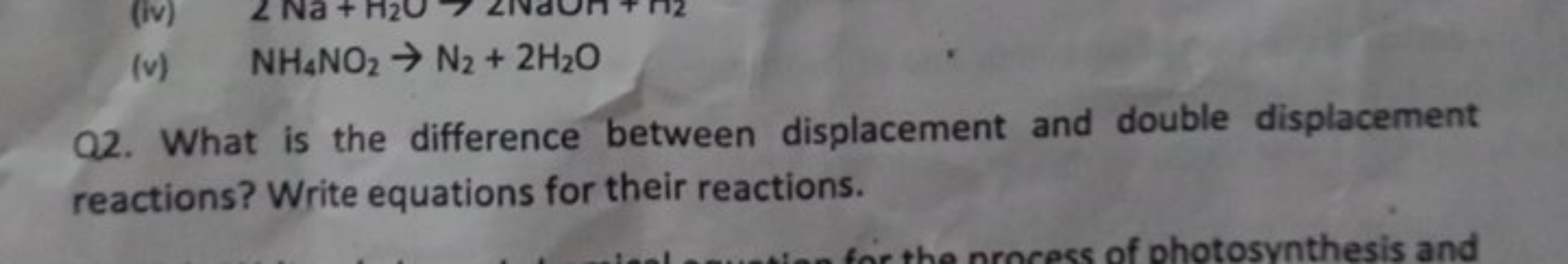 (v) NH4​NO2​→N2​+2H2​O

Q2. What is the difference between displacemen