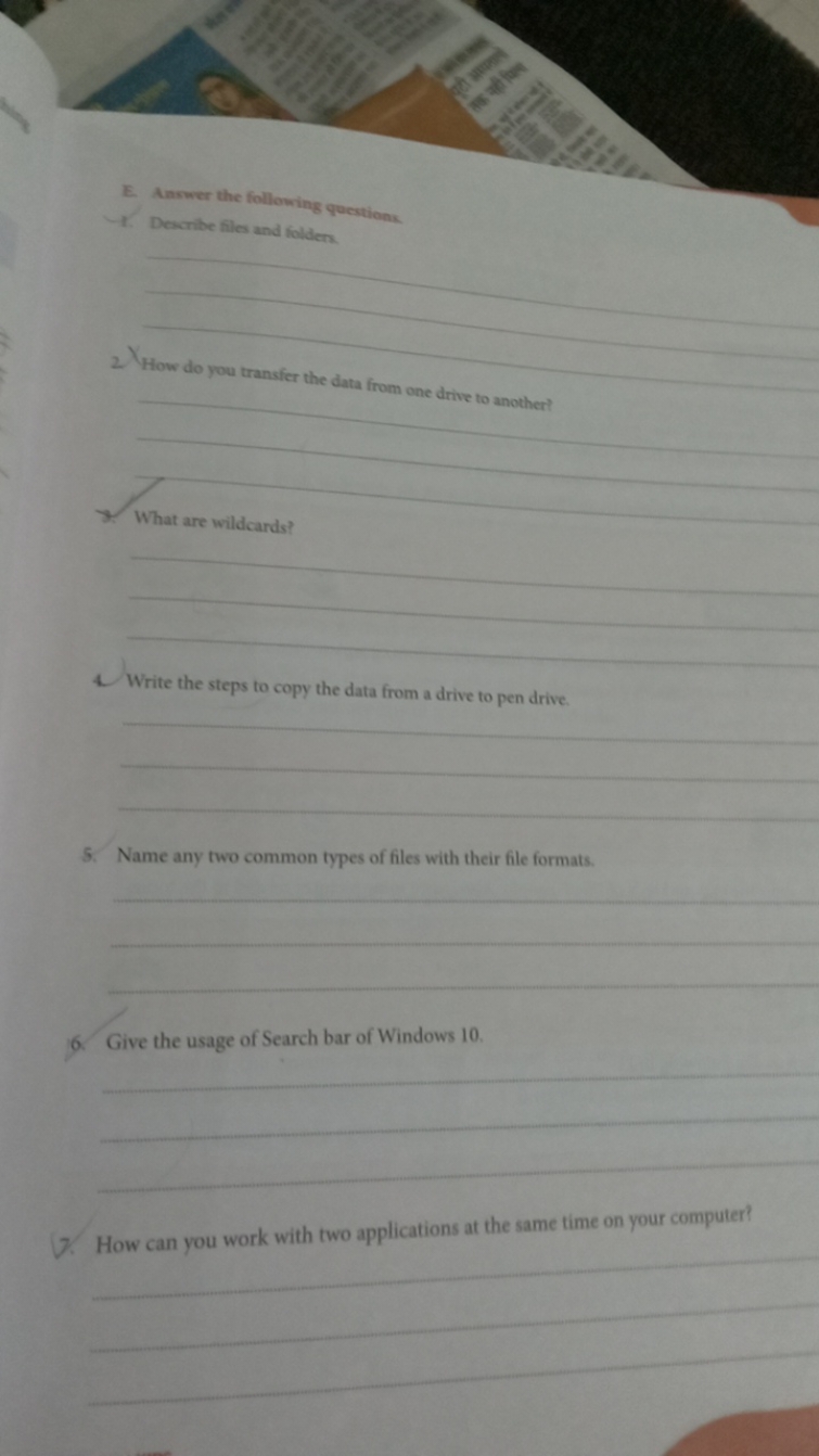 E. Aaswer the following questions.
1. Describe files and folden.
2. Ho