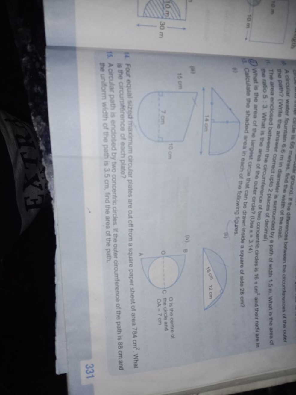 * A circular water ares is 66 metres, find the widthe differences betw