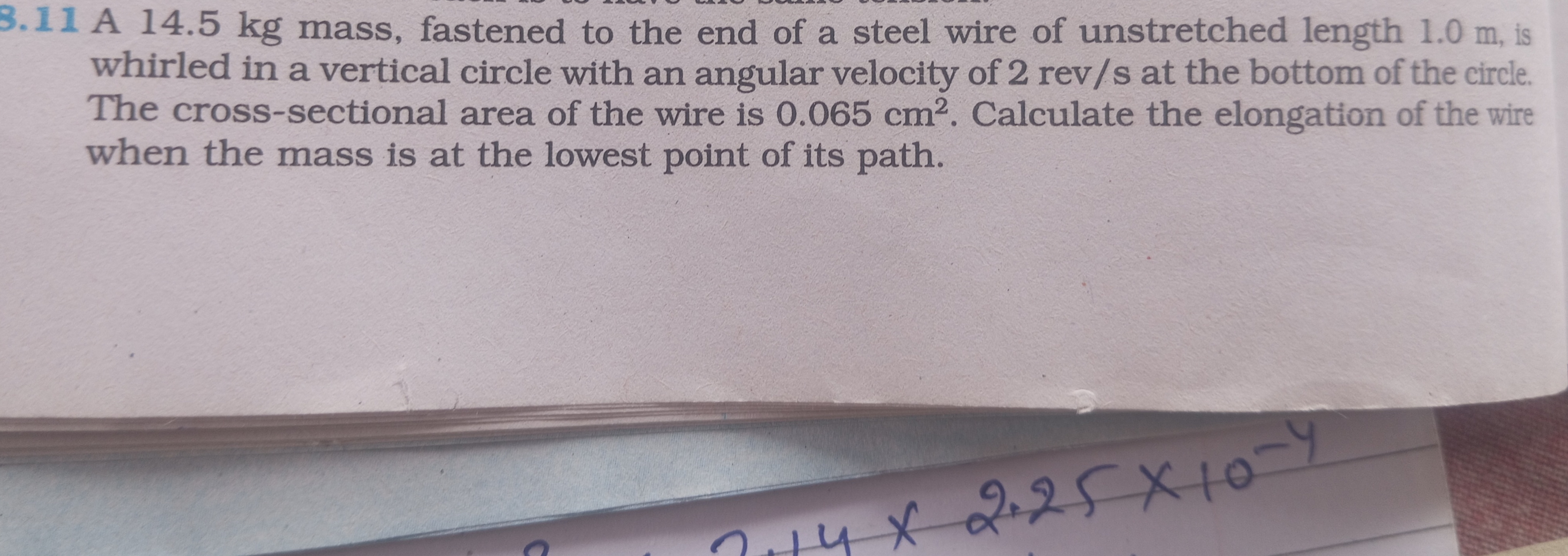 3.11 A 14.5 kg mass, fastened to the end of a steel wire of unstretche